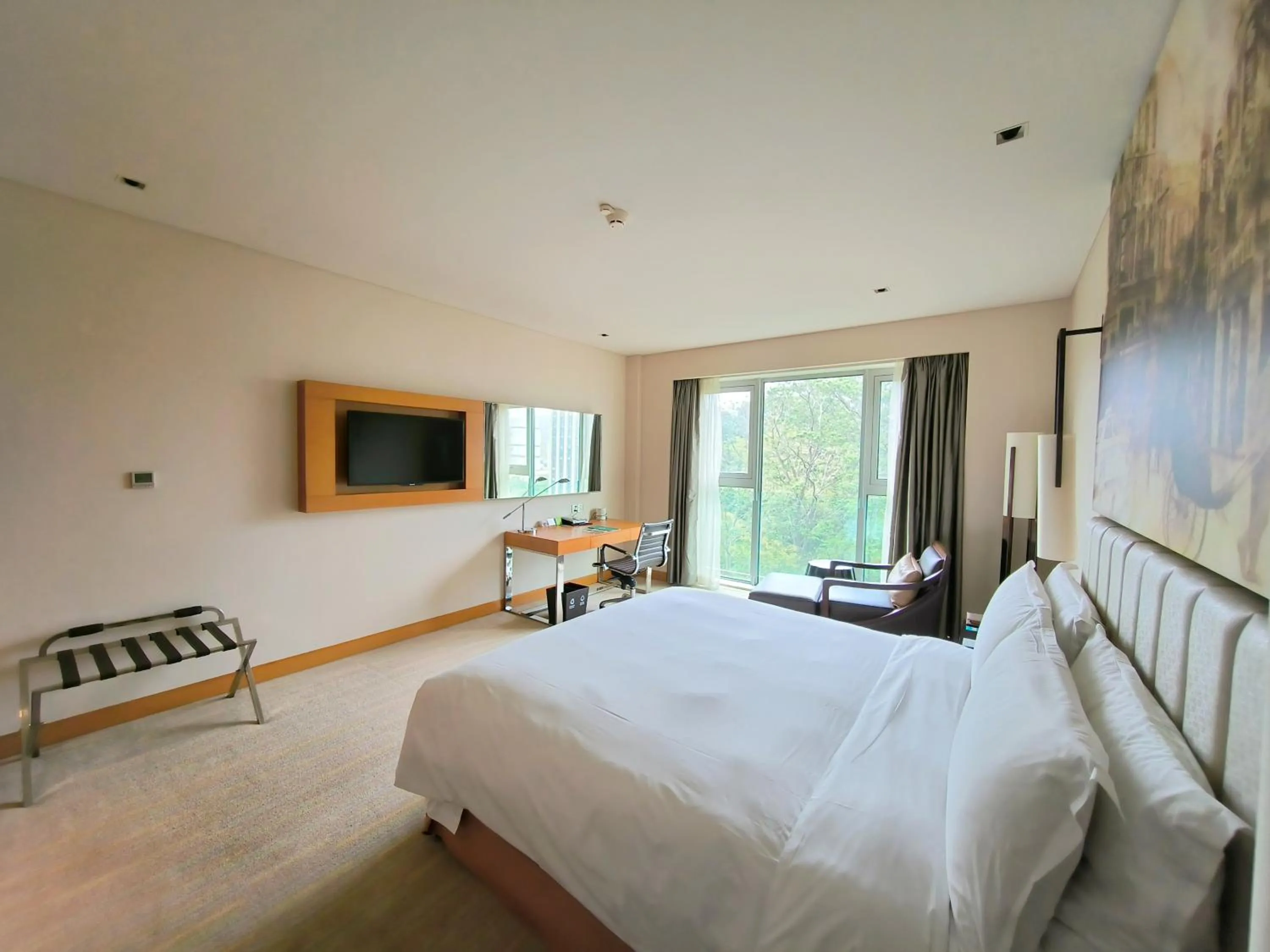 Photo of the whole room in Junluxe Hotel Guangzhou Science City-Free Shuttle Bus Service to Guangzhou Canton Fair