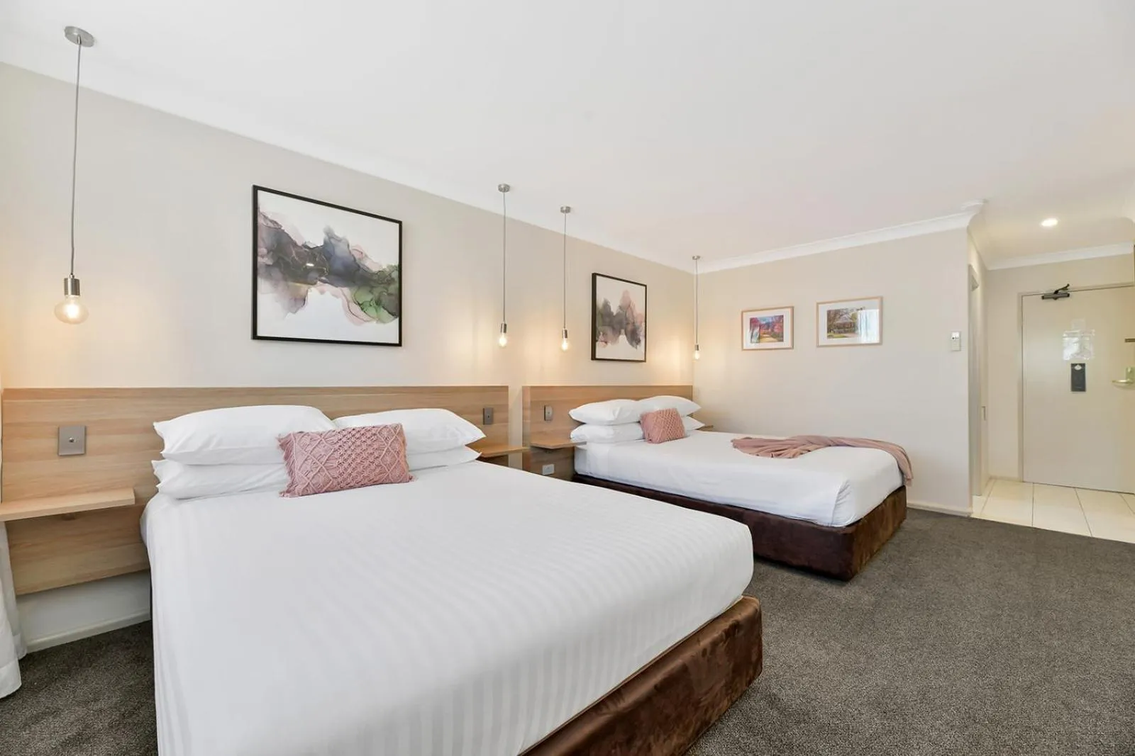 Bed in Central Caleula Motor Lodge