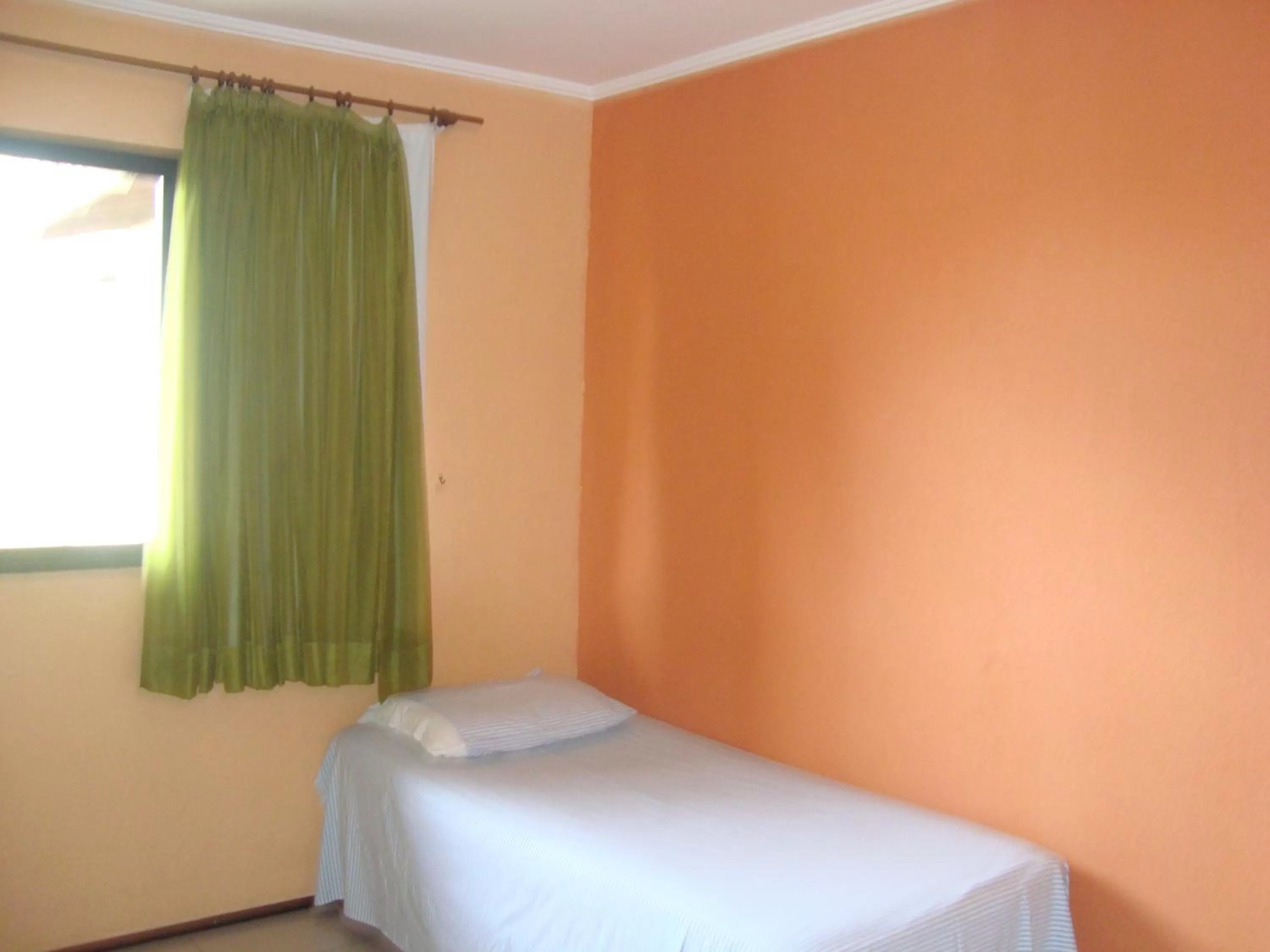 Bed in Pousada Vianna's