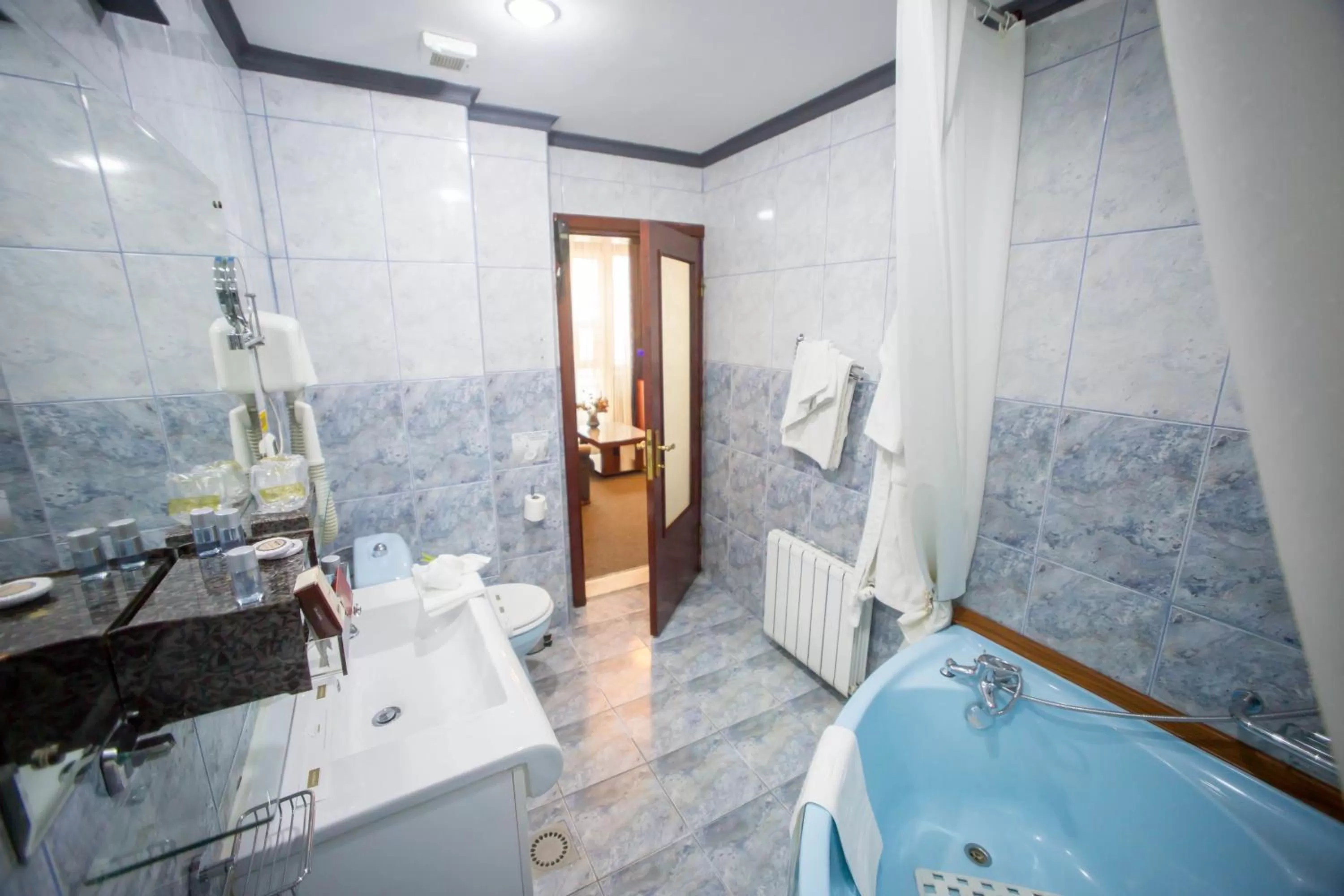 Shower in Bucharest Comfort Suites Hotel