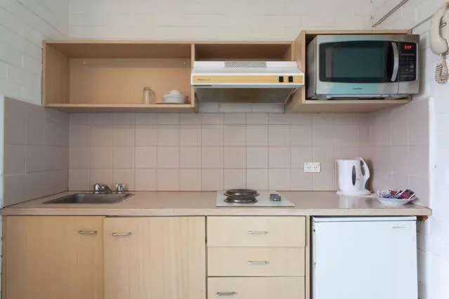 Kitchen or kitchenette in H & D Apartments