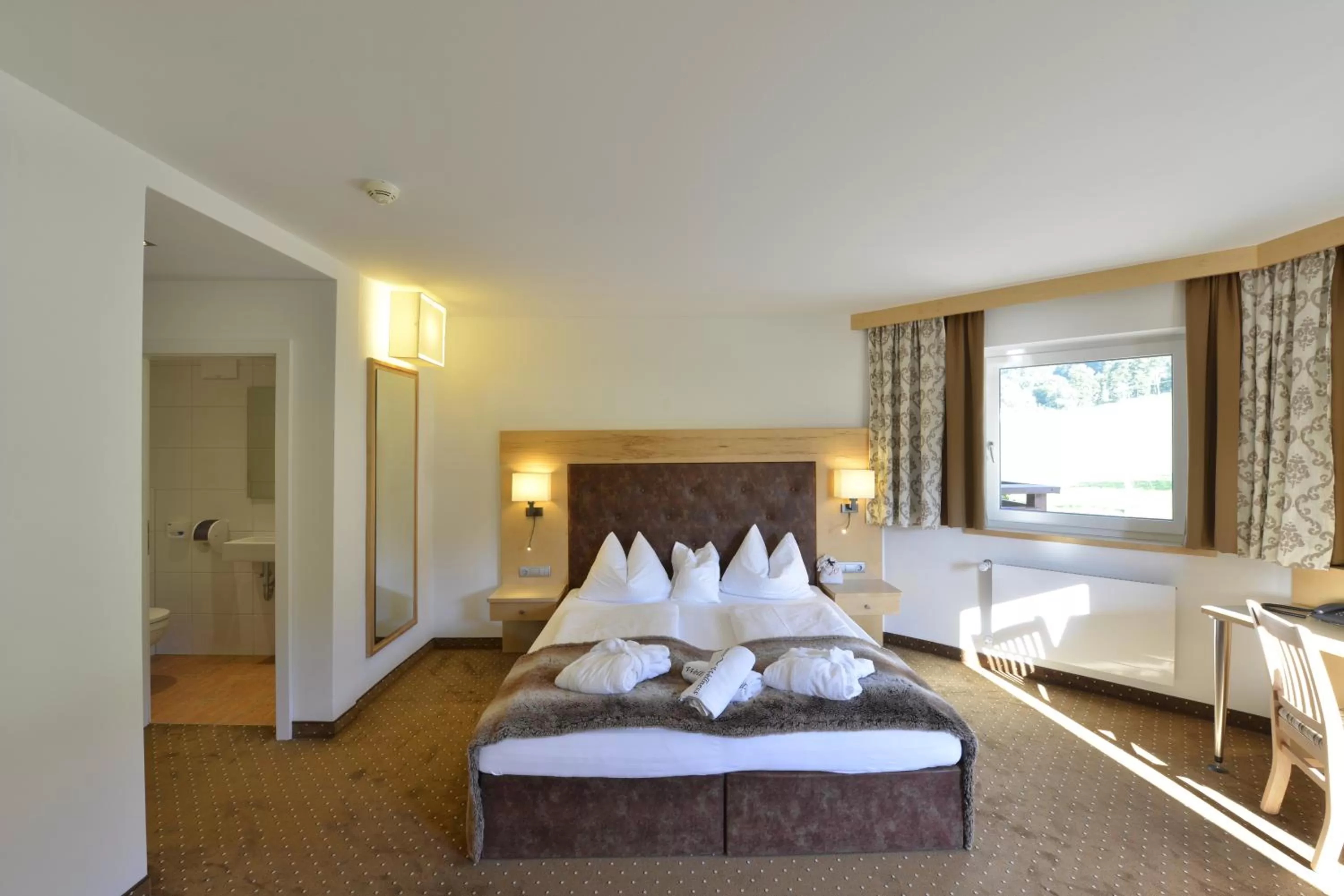 Bed in Hotel Der Wastlhof - direkt an der Skipiste Wellness & Spa