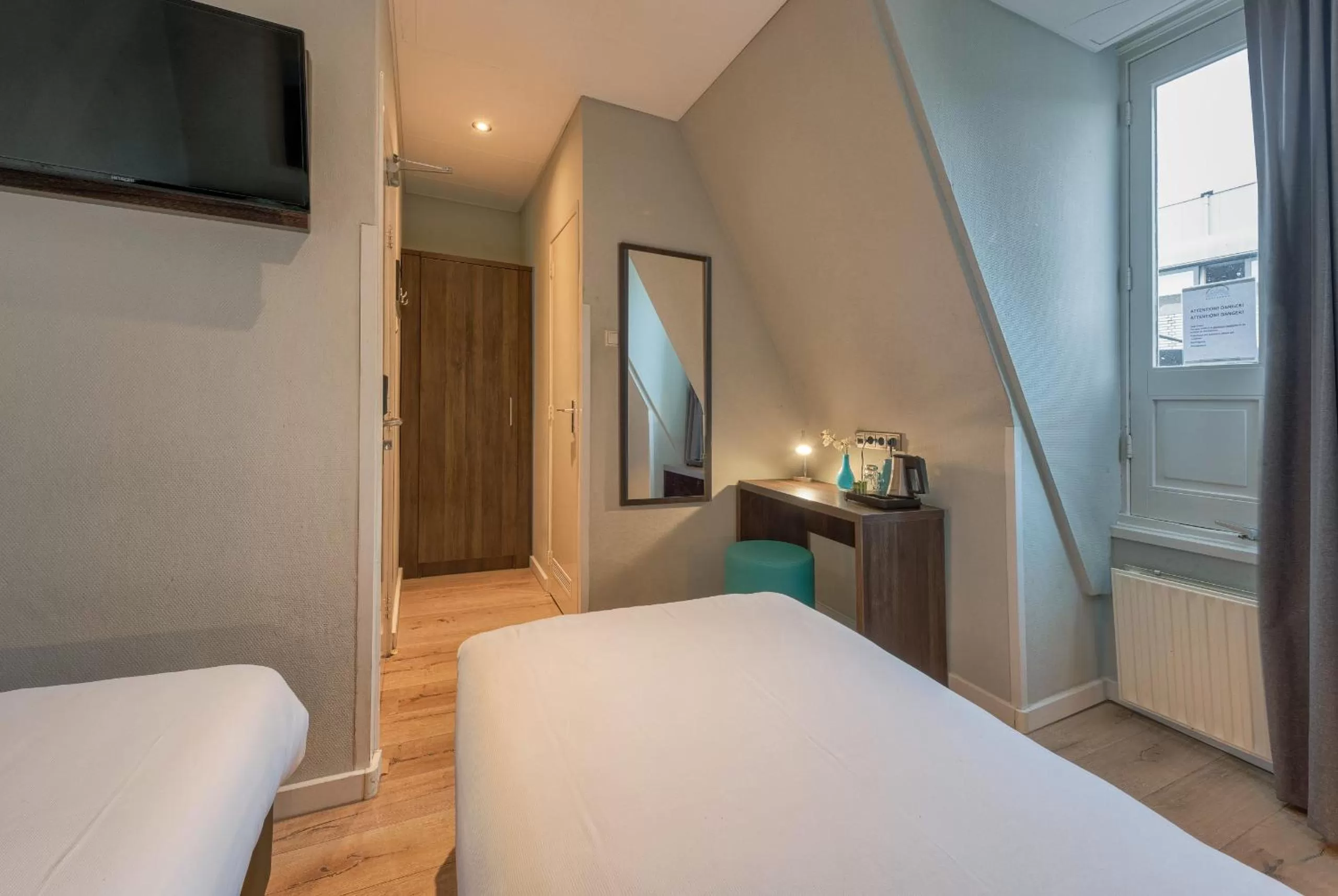 Bed in Hotel Damsquare