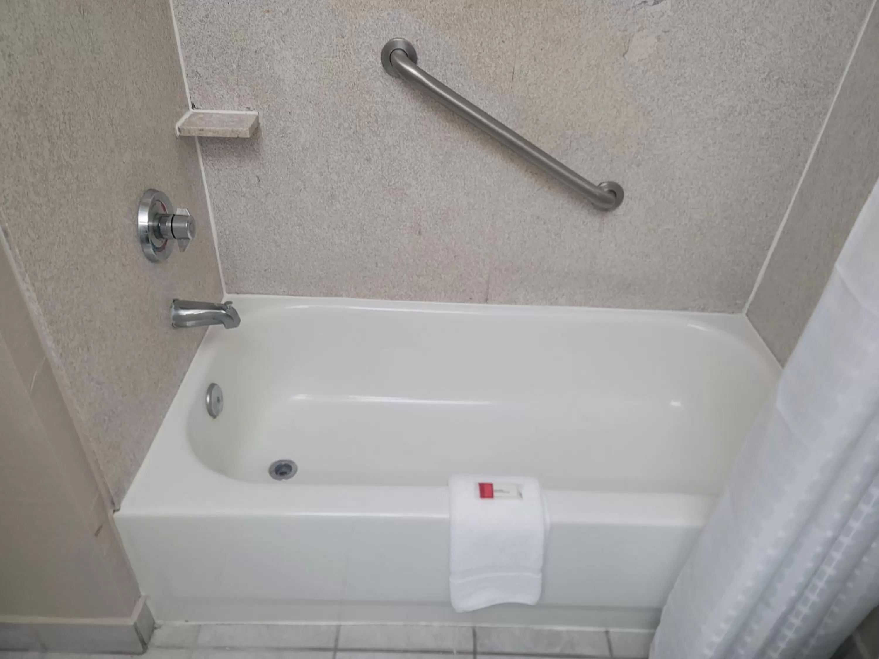 Bathroom in Baymont by Wyndham Houston Brookhollow