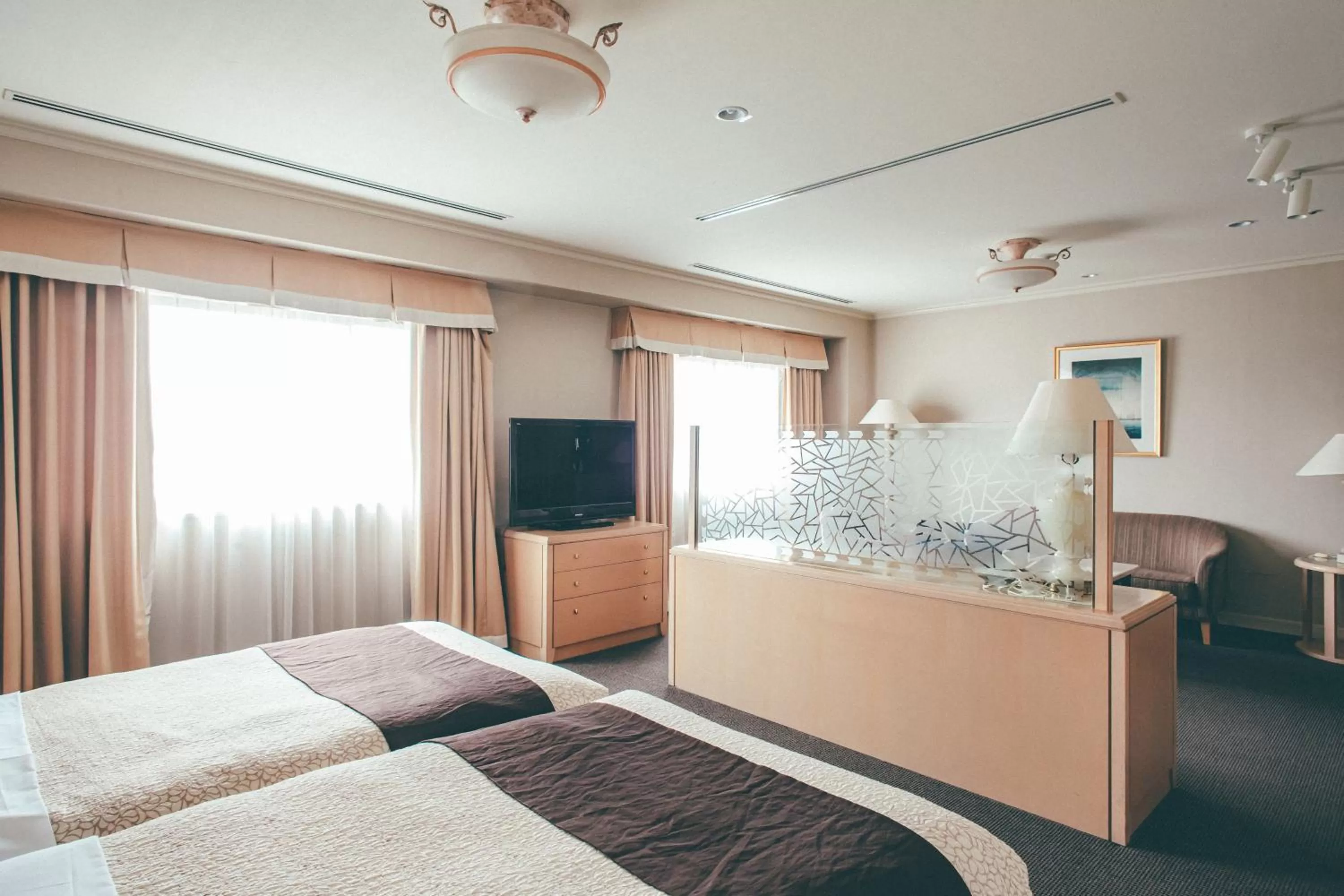 Bed in Numazu River Side Hotel