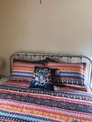 Bed in Chateau Country Inn and Captain's Cottage