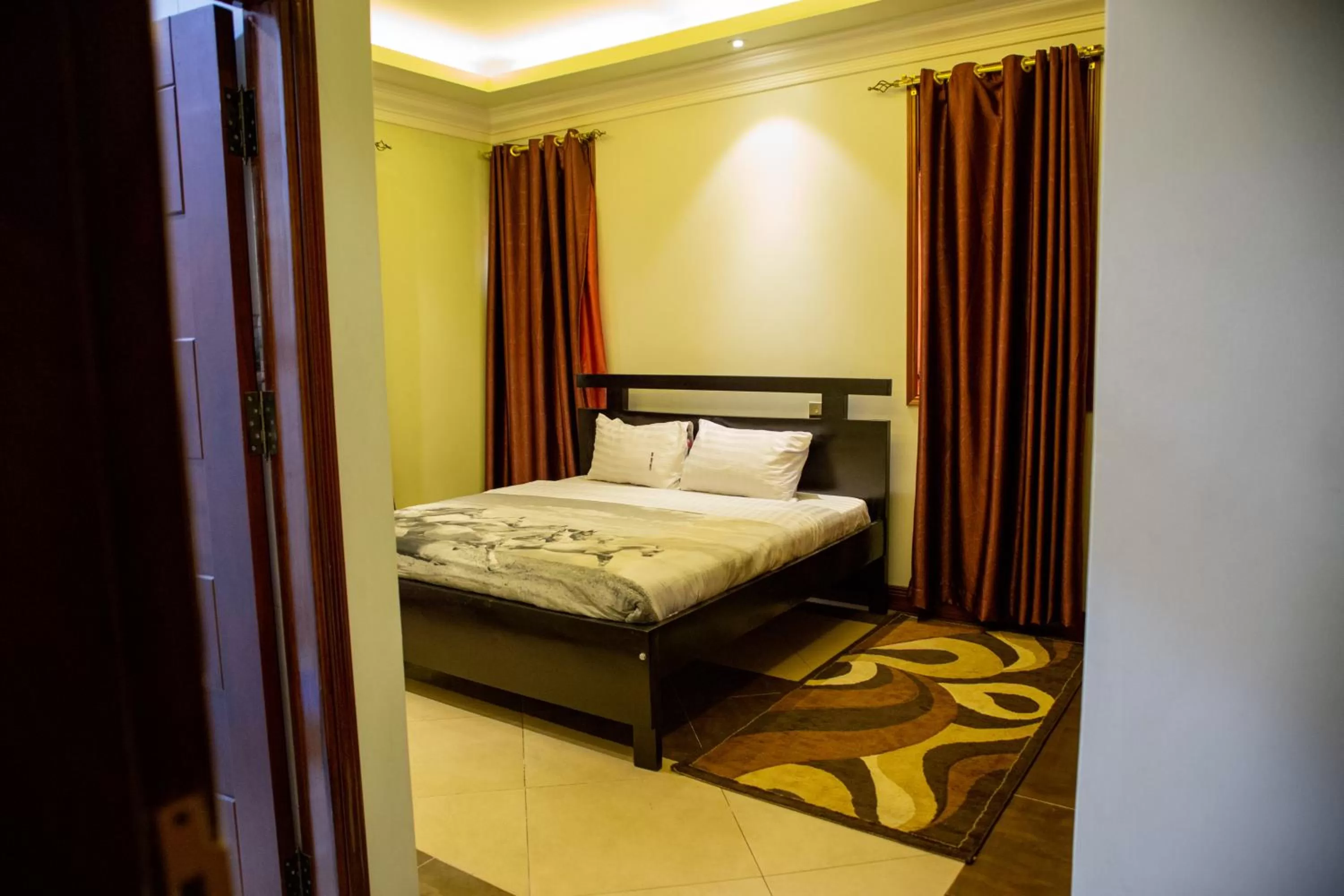 Bed in Dina Apartments