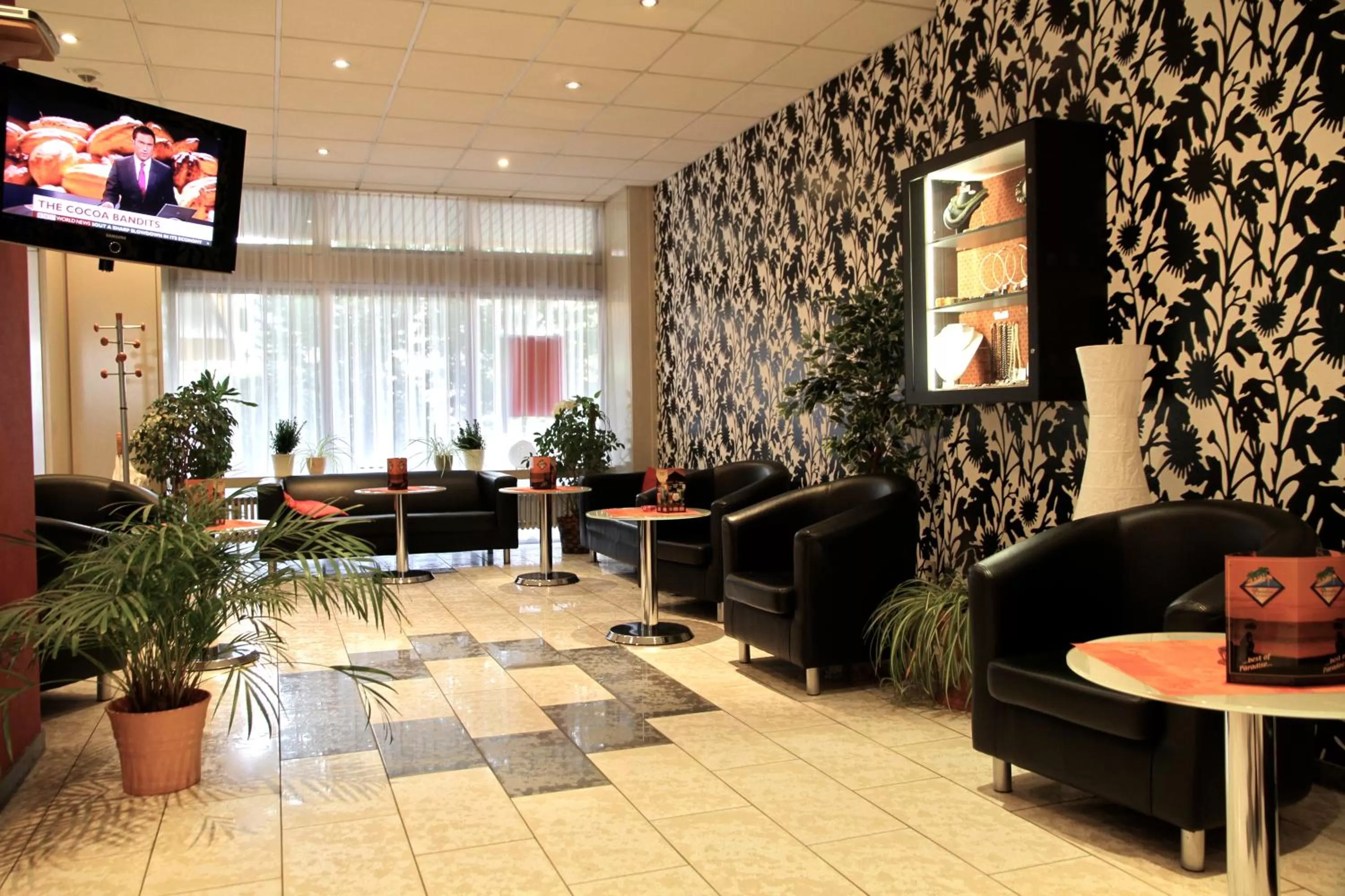 Lobby or reception in Opal Hotel