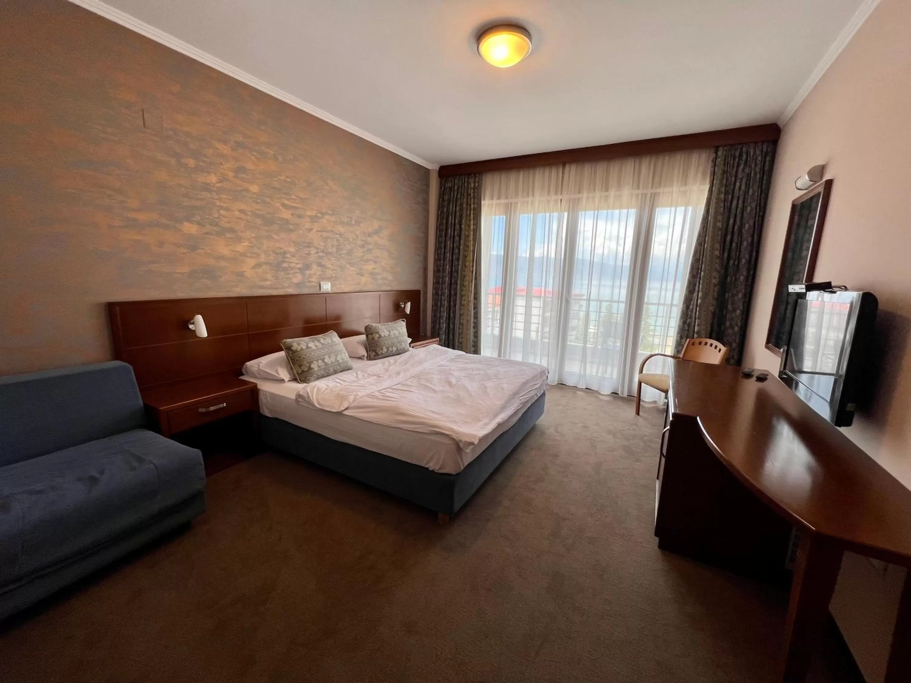 Bed in Hotel Millennium