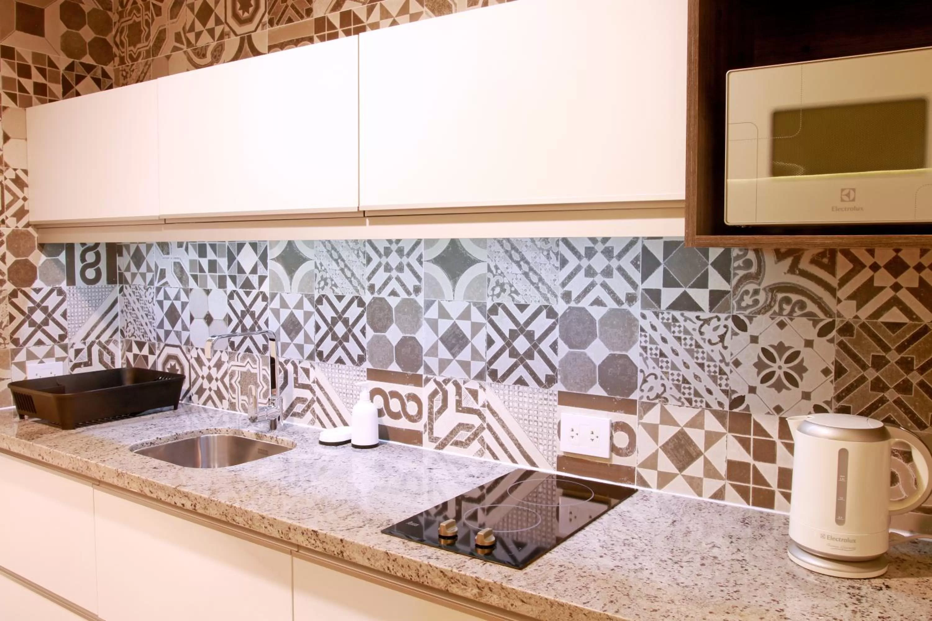 Kitchen or kitchenette in Urban Suites Apart Hotel