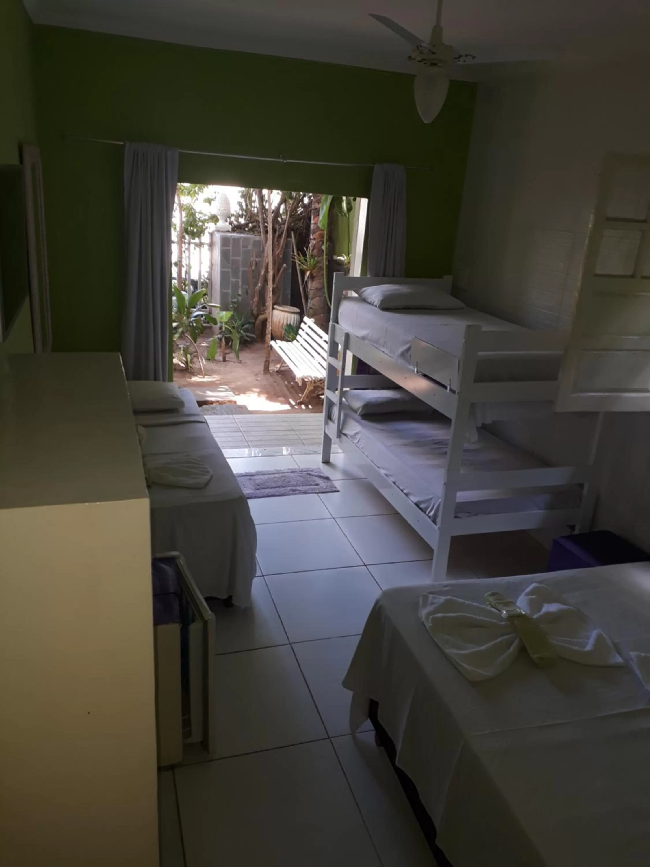 Bed in Hotel Pousada Papaya Verde