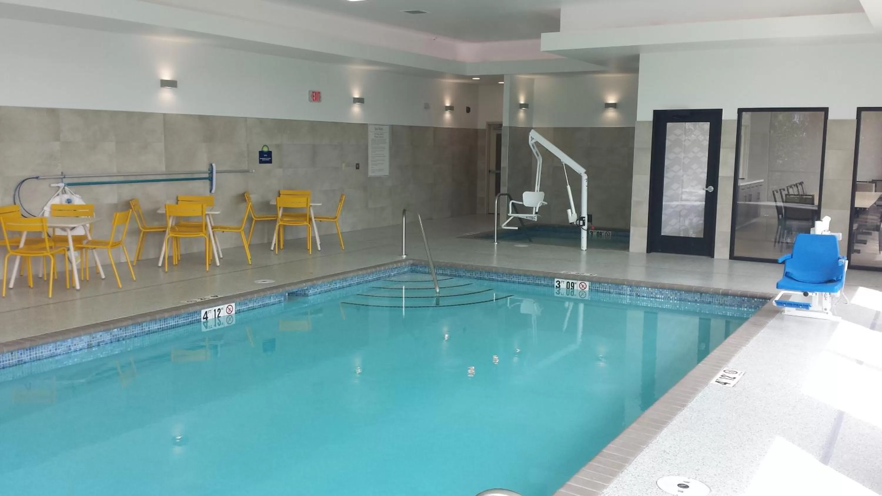 Swimming pool in Days Inn & Suites by Wyndham Duluth by the Mall