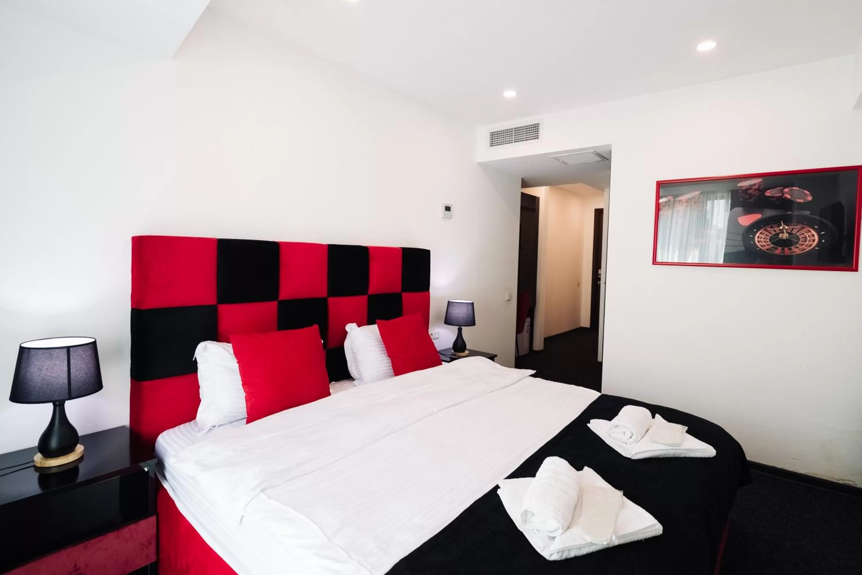 Bed in Royal Plaza Hotel