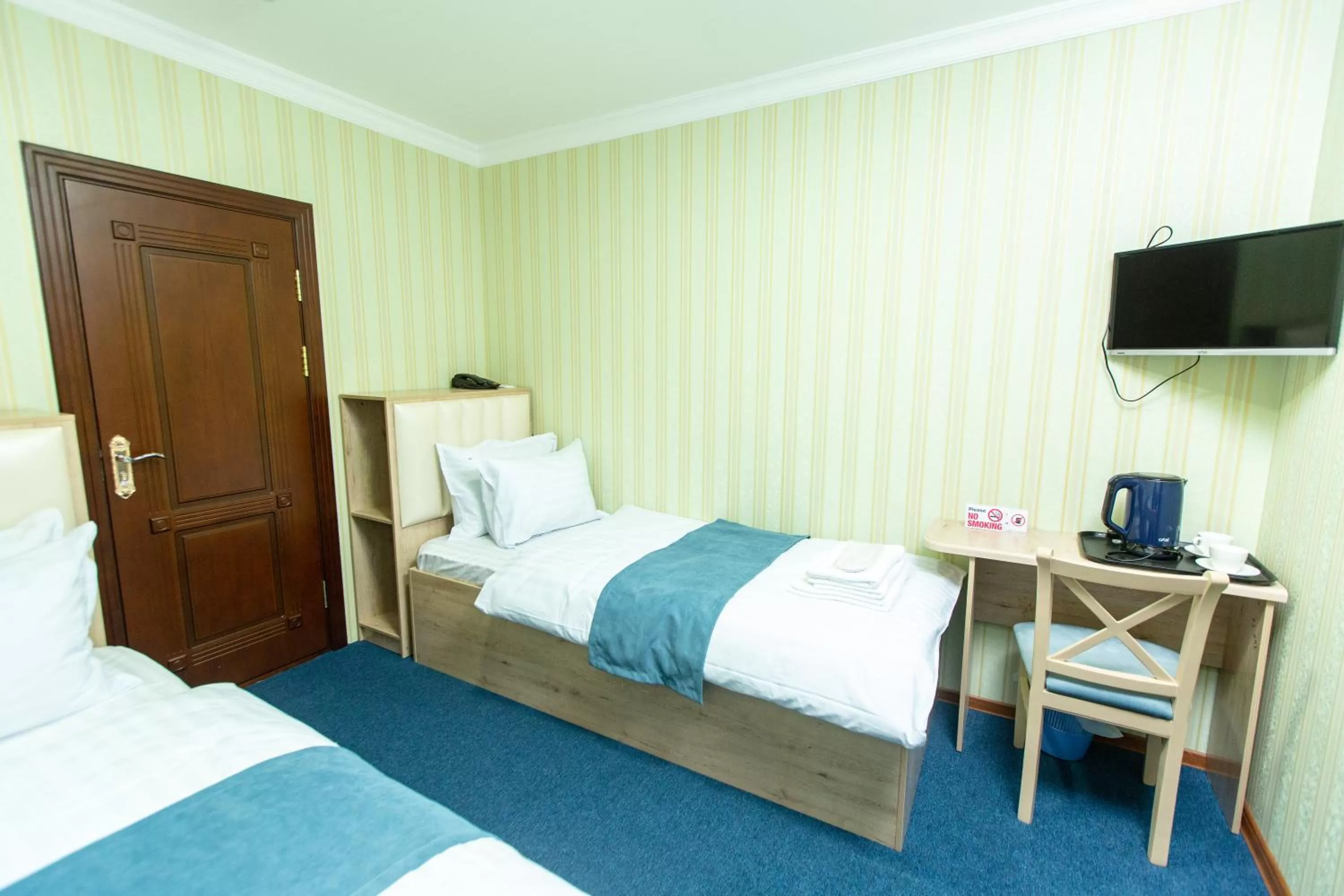 Bed in Mirzo Boutique Hotel