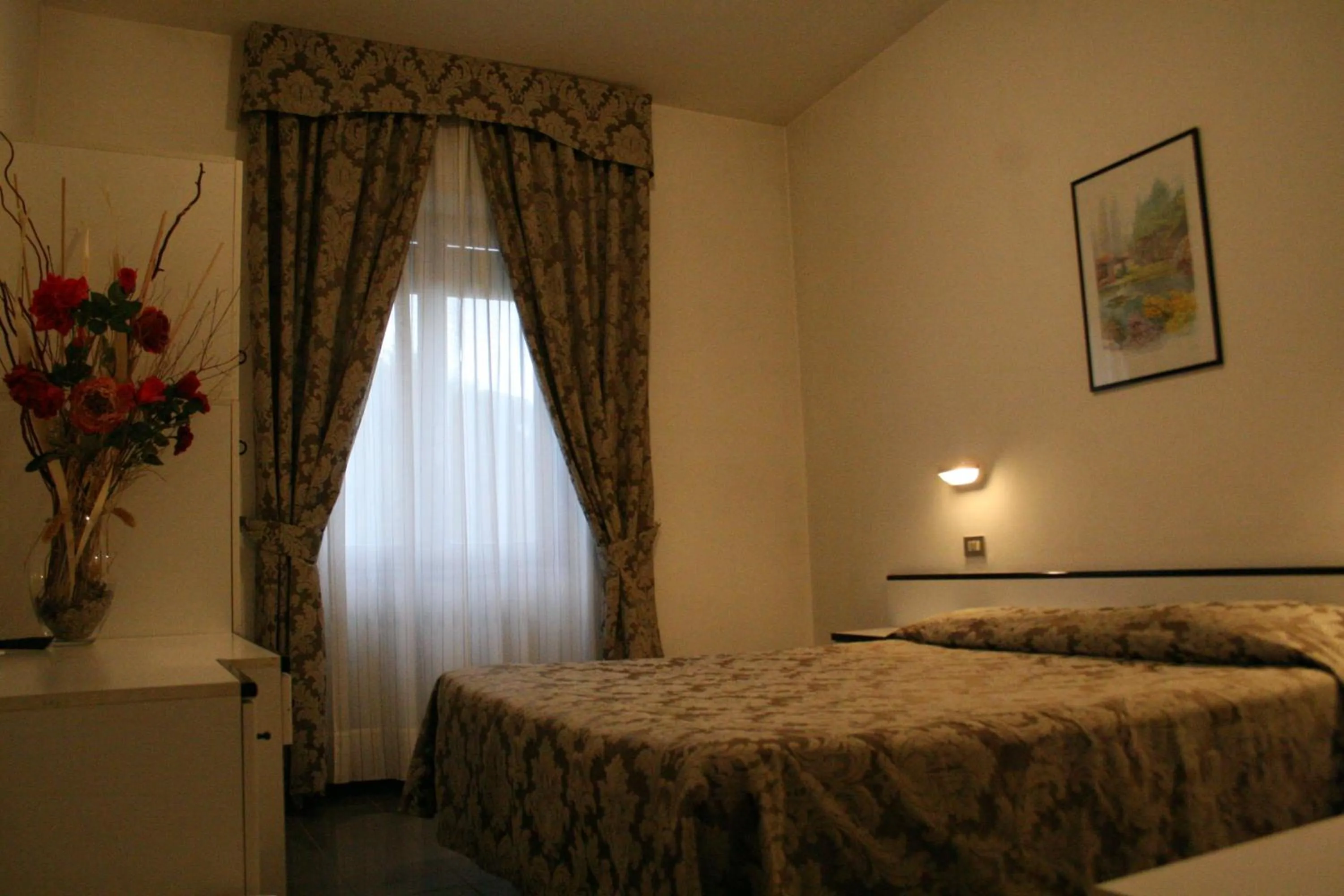 Bed in Hotel La Meridiana