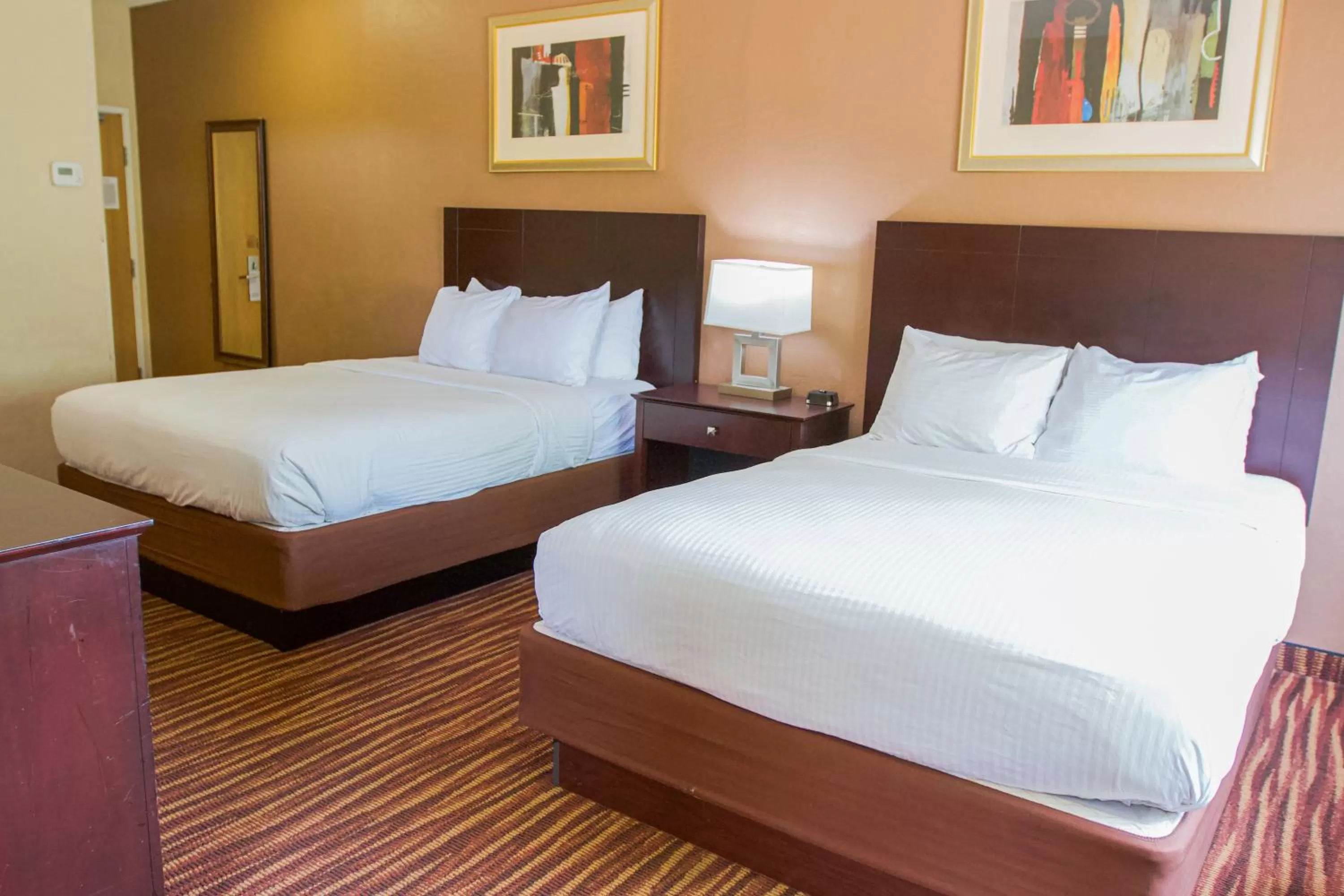 Bed in First Choice Inn at the Swell