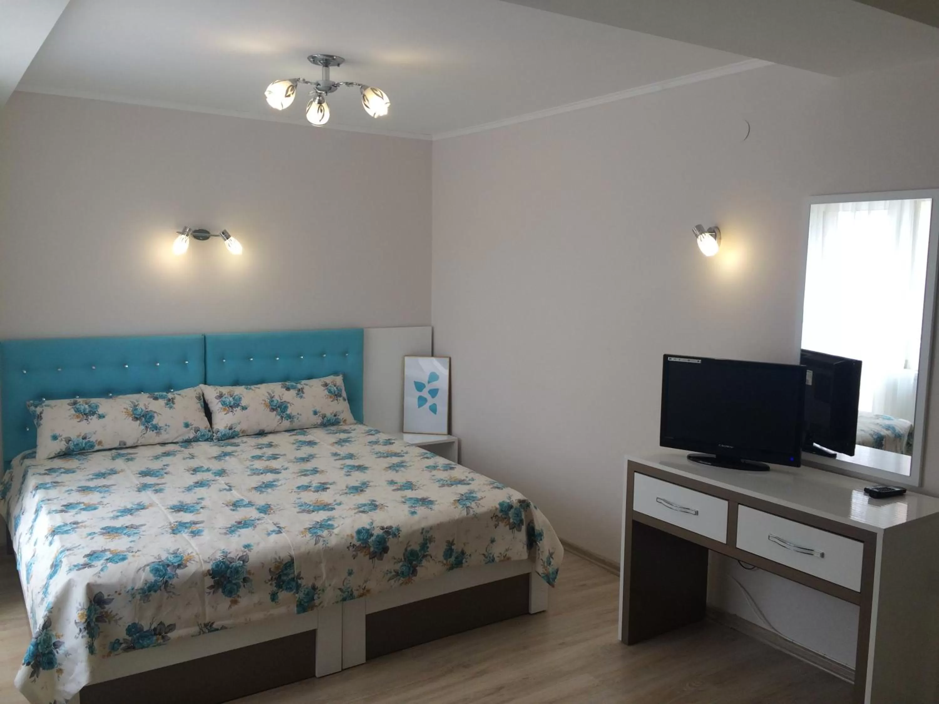 Bed in White Rose Guest Rooms