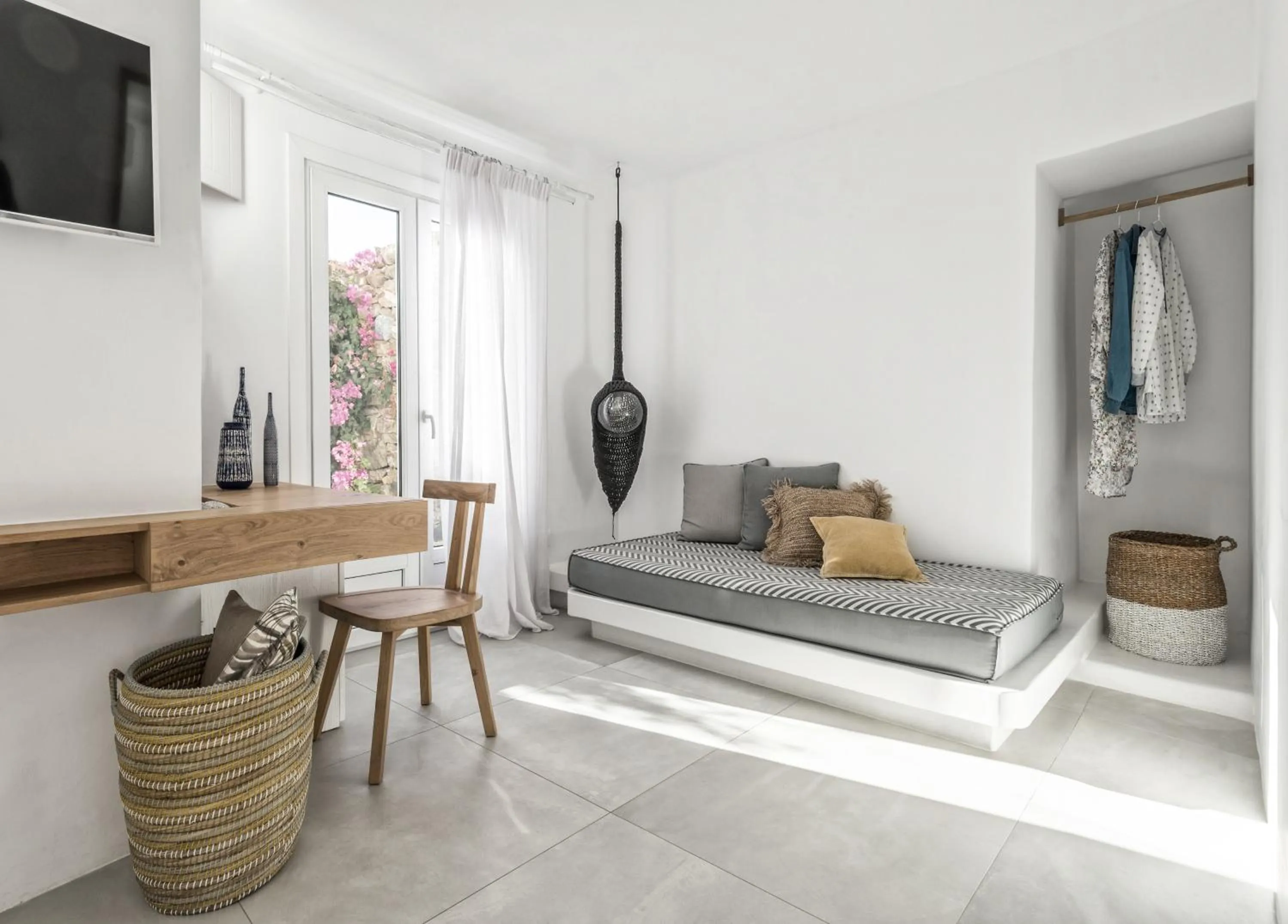 Seating area, Bed in A Hotel Mykonos