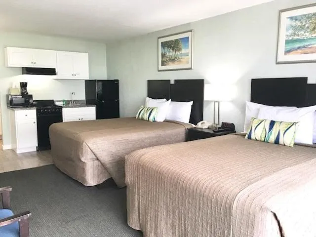 Bed in Ocean Plaza Motel