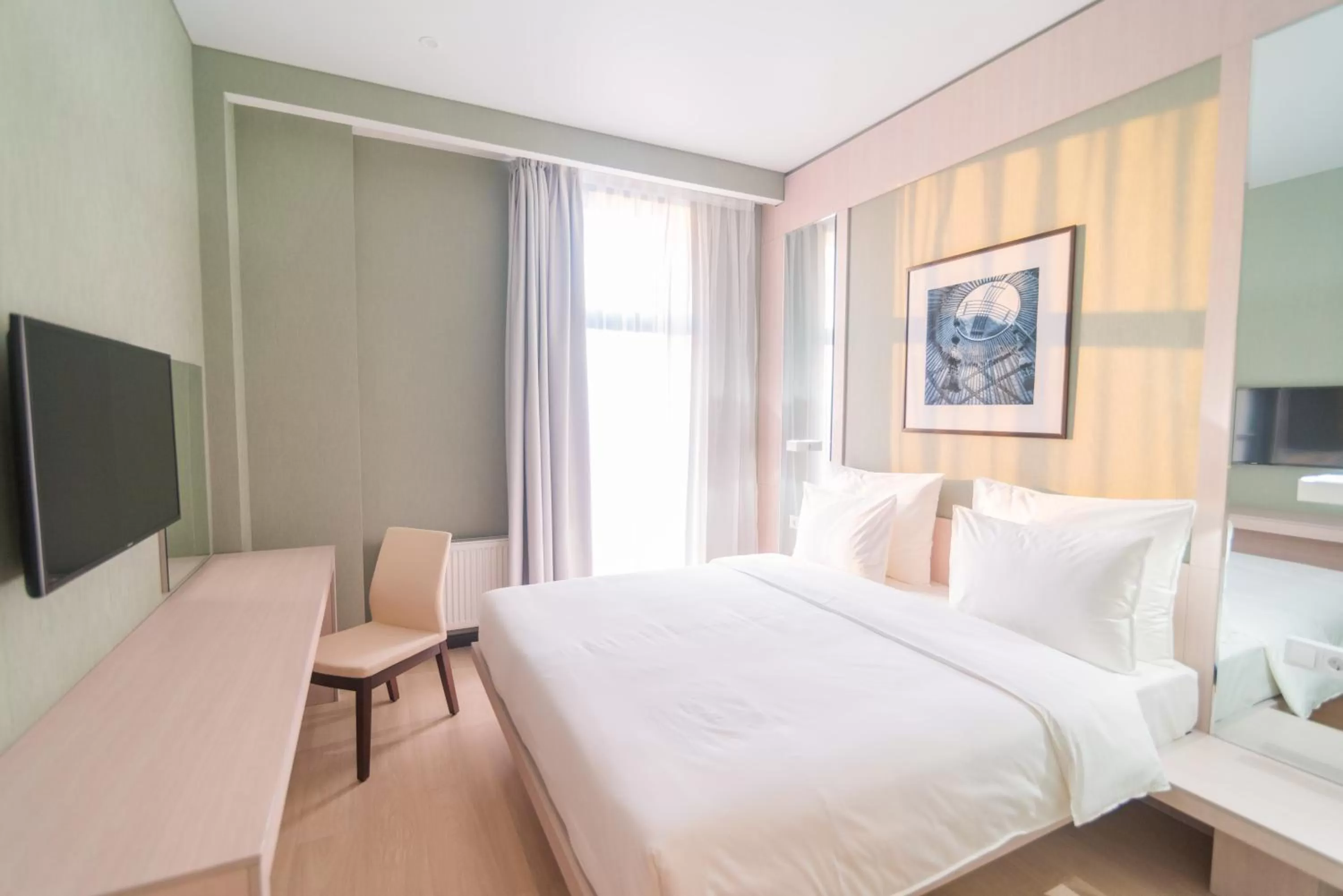 Bed in Resident City Hotel