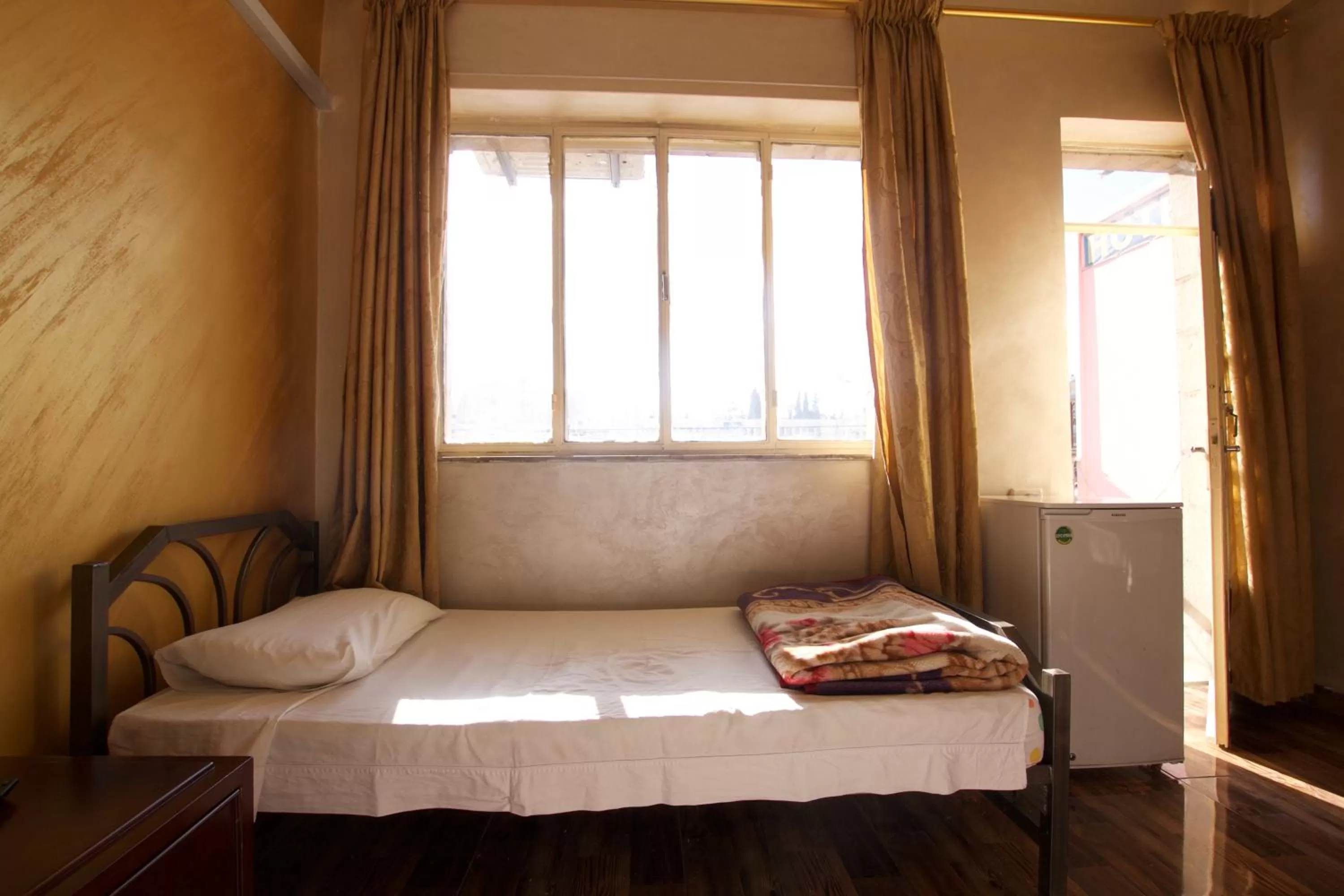 Bed in Sun Rise Hotel & Hostel & Tours