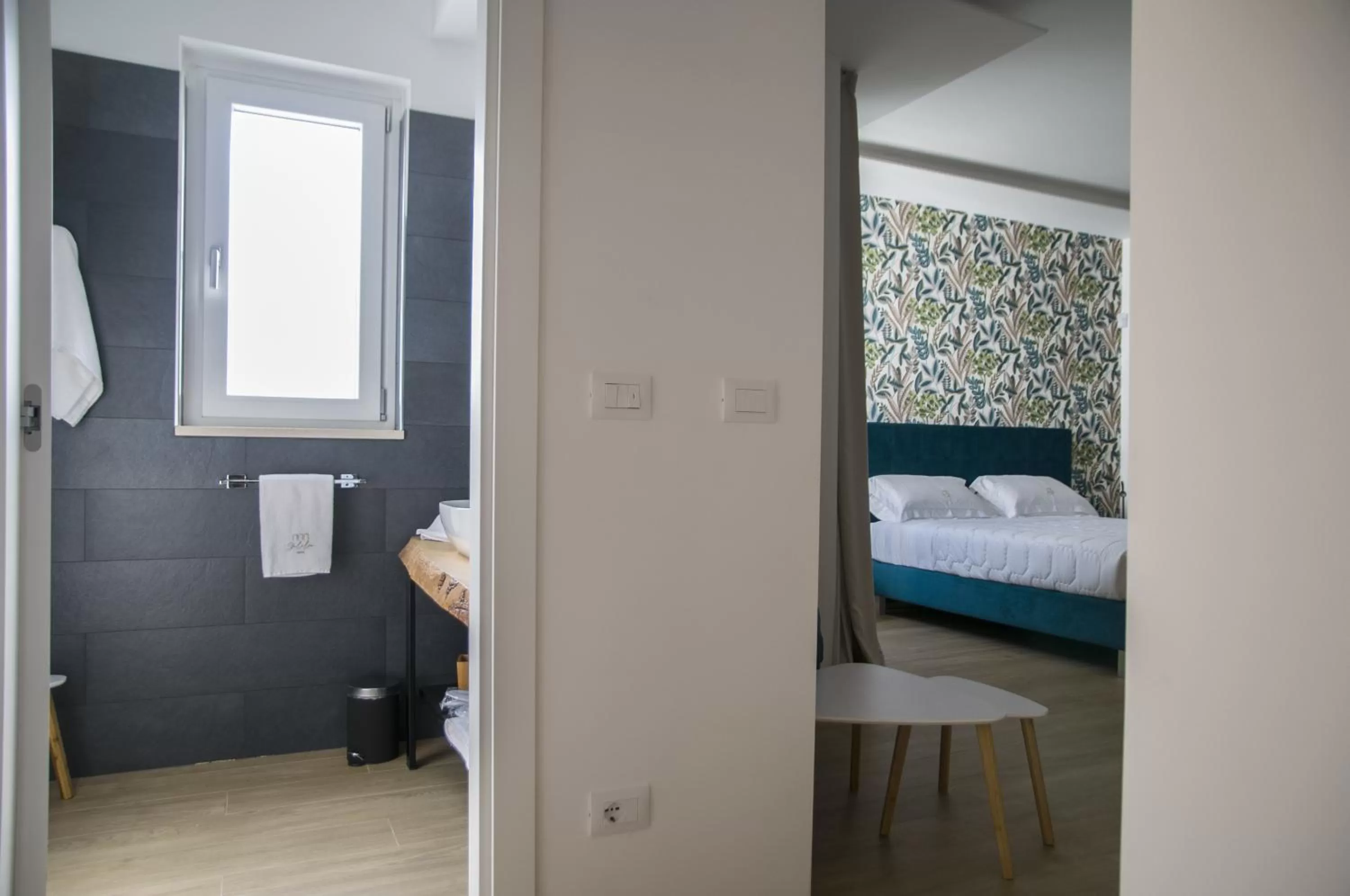 Photo of the whole room, Bed in Galileo Suite