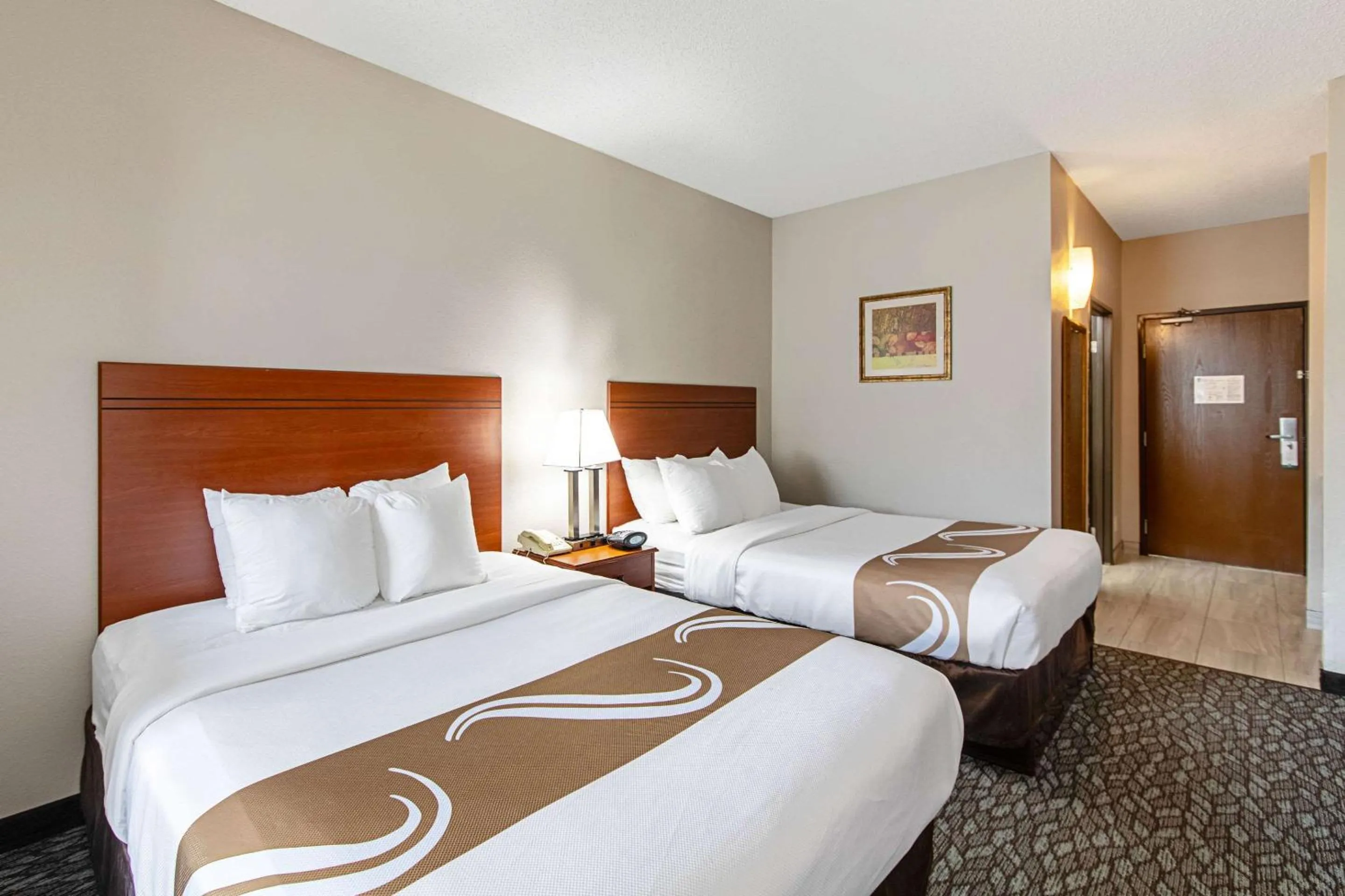 Bedroom, Bed in Quality Suites Austin South Street Elmo District