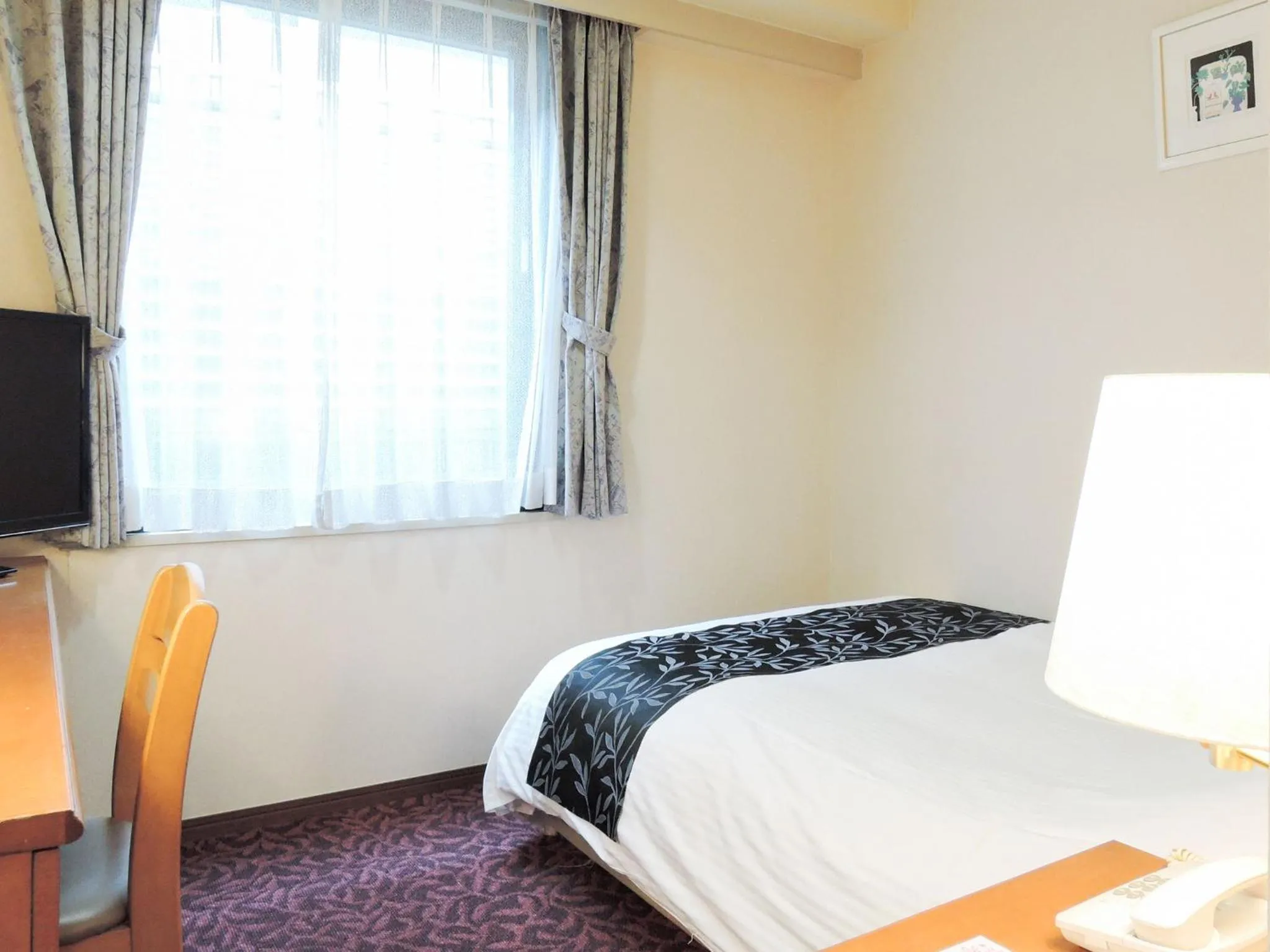 Photo of the whole room, Bed in Kobe City Gardens Hotel (Formally Hotel Kobe Shishuen)