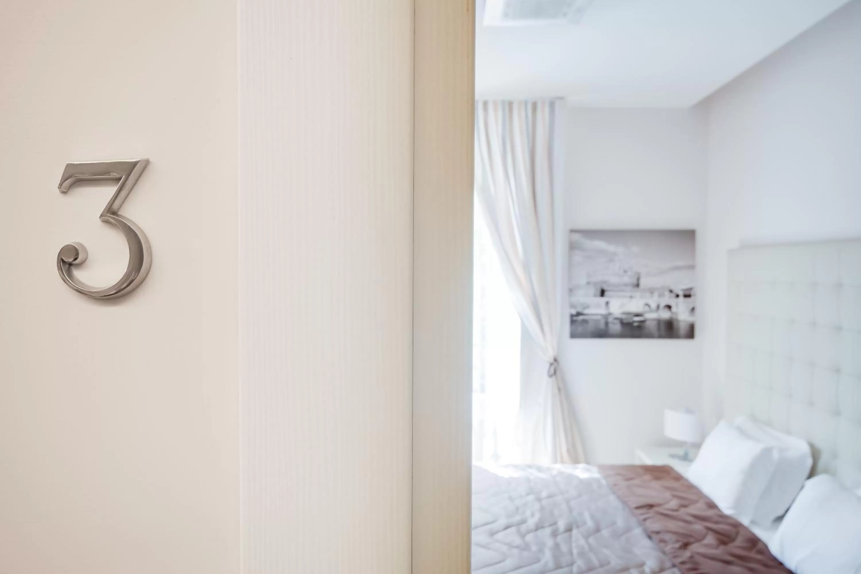 Bed in Rome River Inn