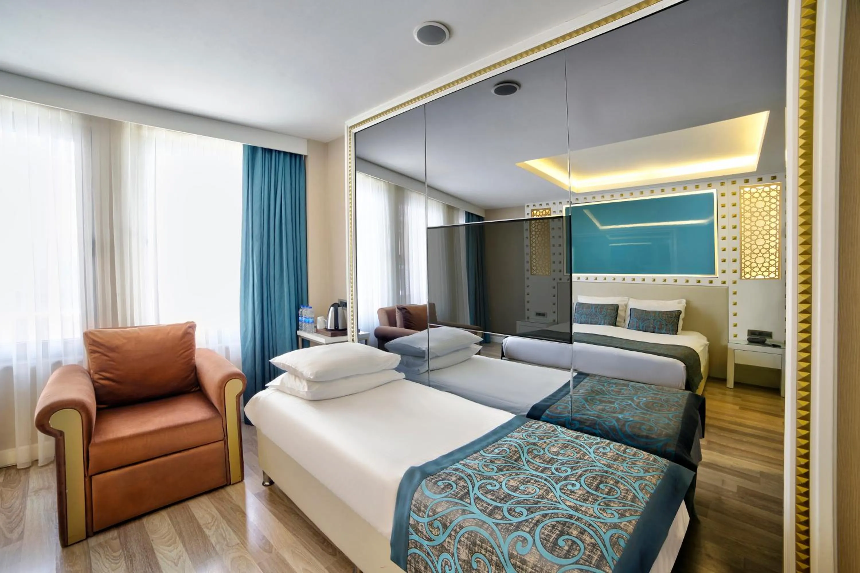 Bed in Great Fortune Hotel & Spa