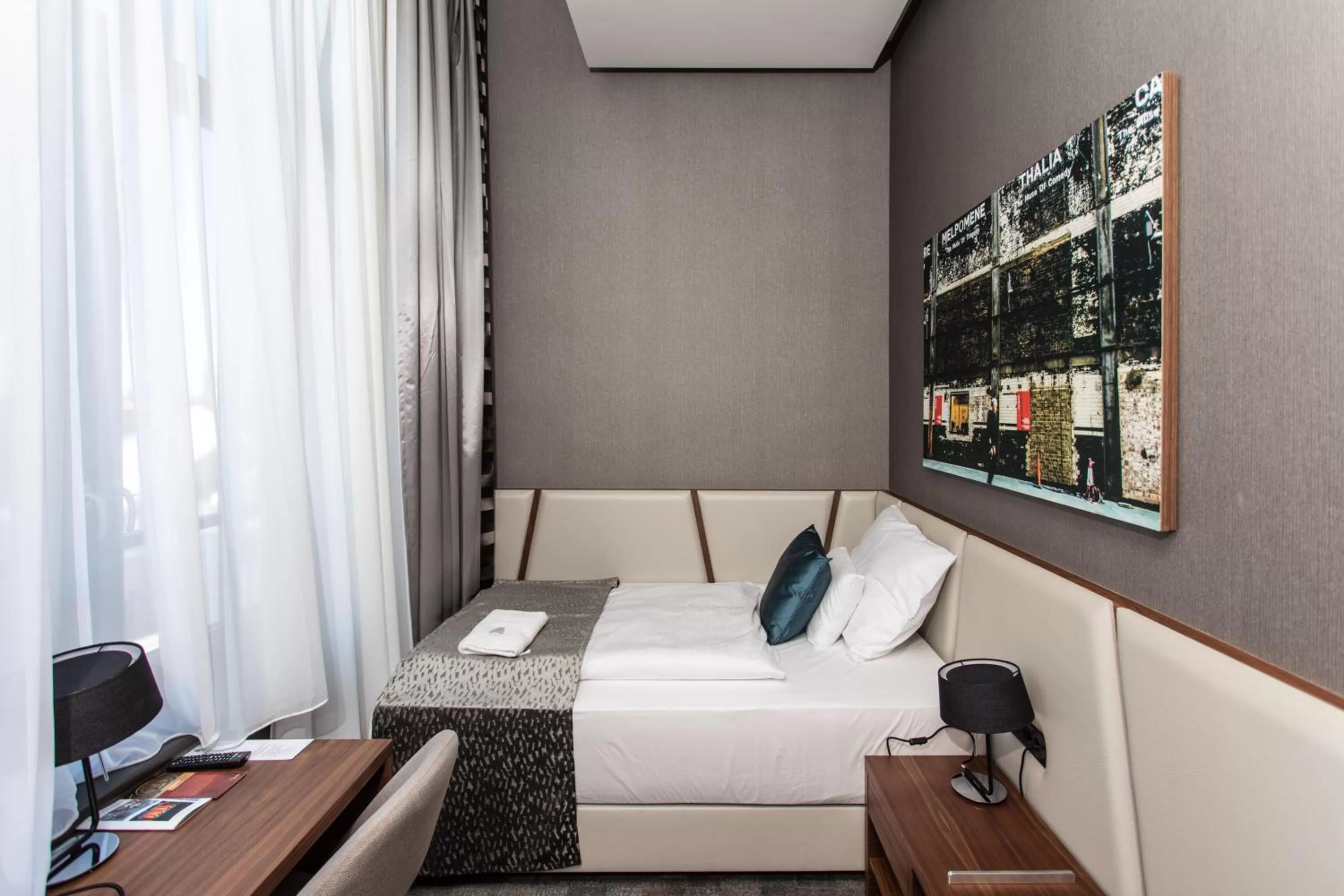 Bed in Artis Boutique Hotel