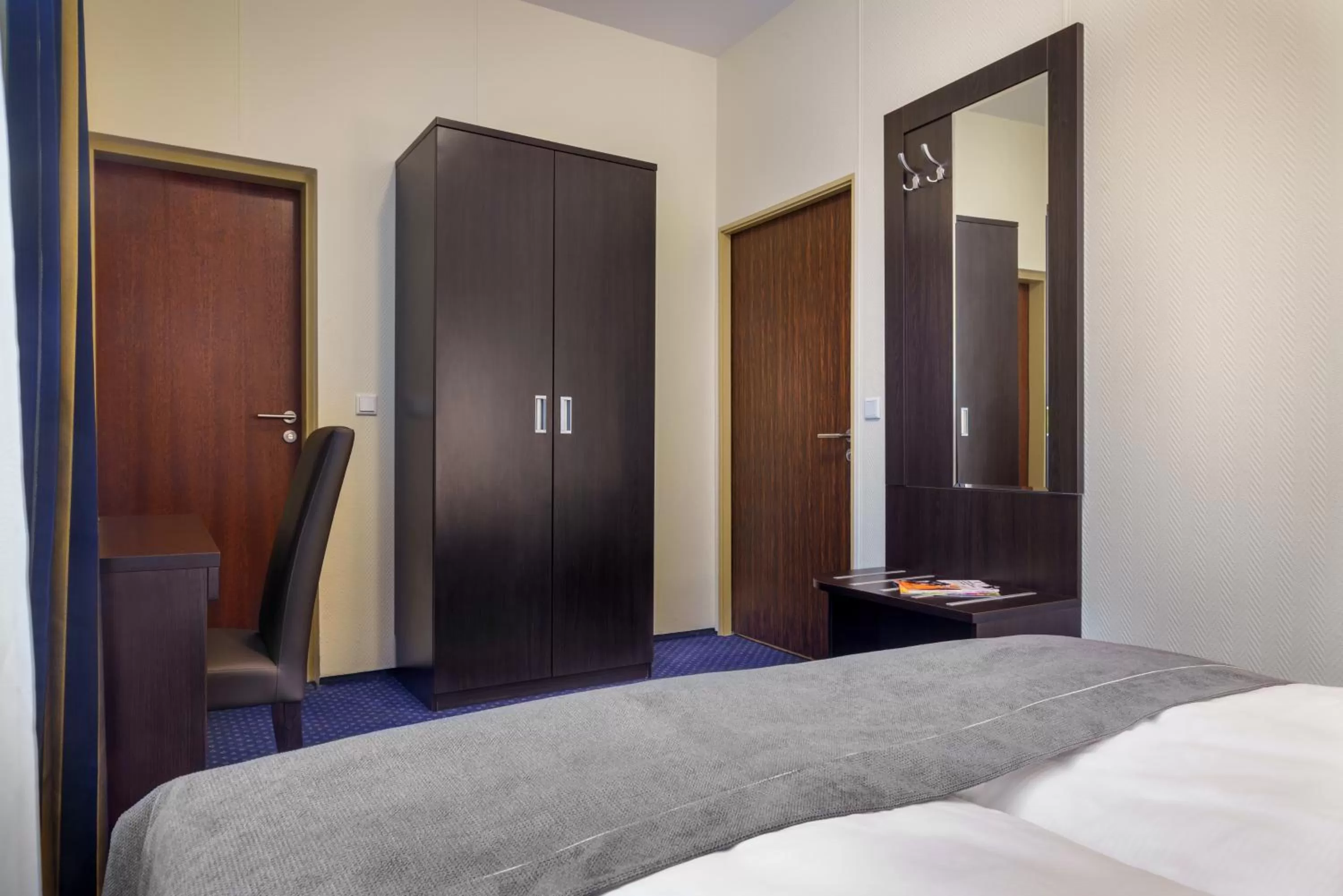 Bed in Hotel Continental Hamburg Hauptbahnhof