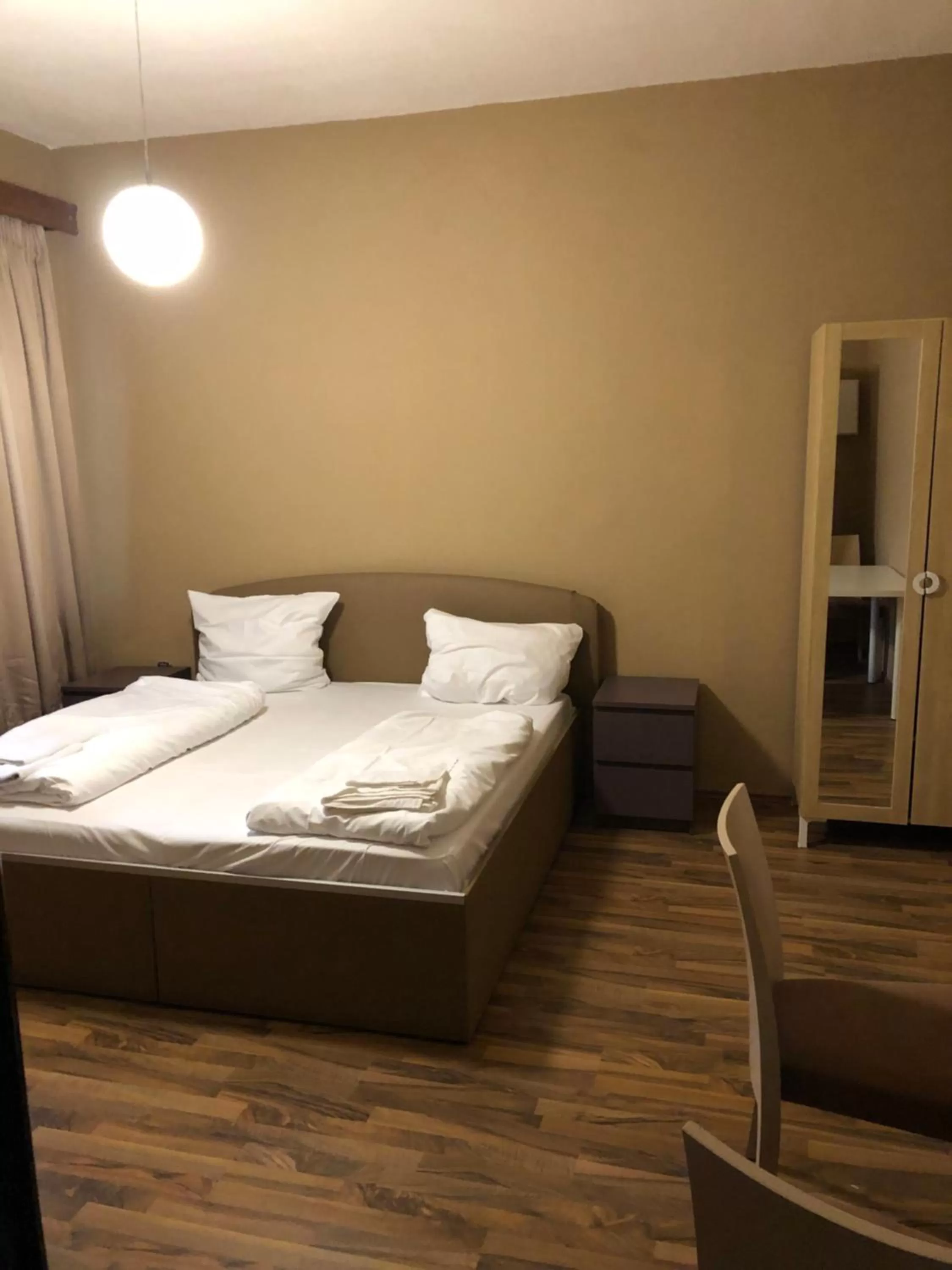 Bed in Hotel Poseidon