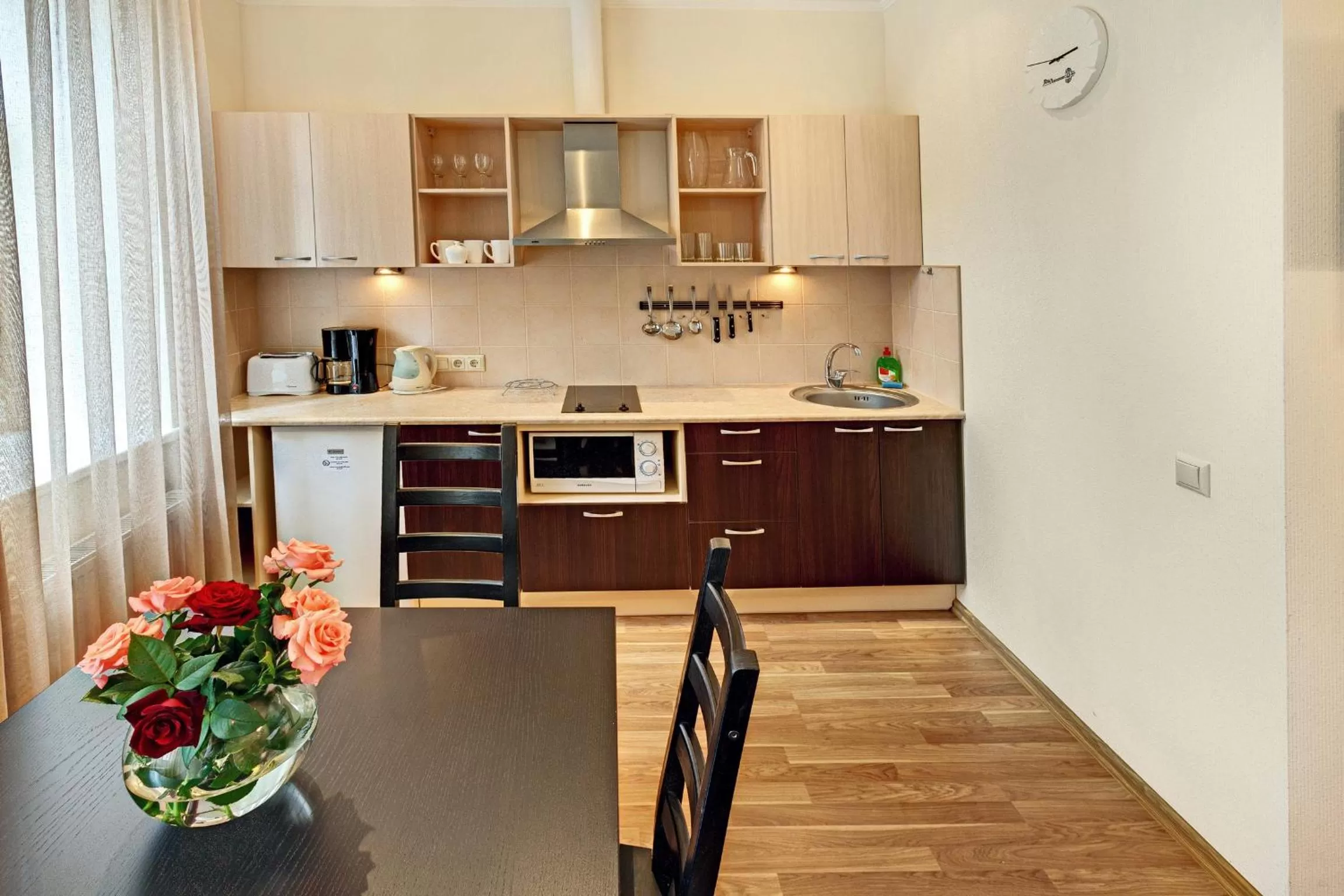 Kitchen or kitchenette in RIGAAPARTMENT SONADA Self-Service Aparthotel - Private Parking