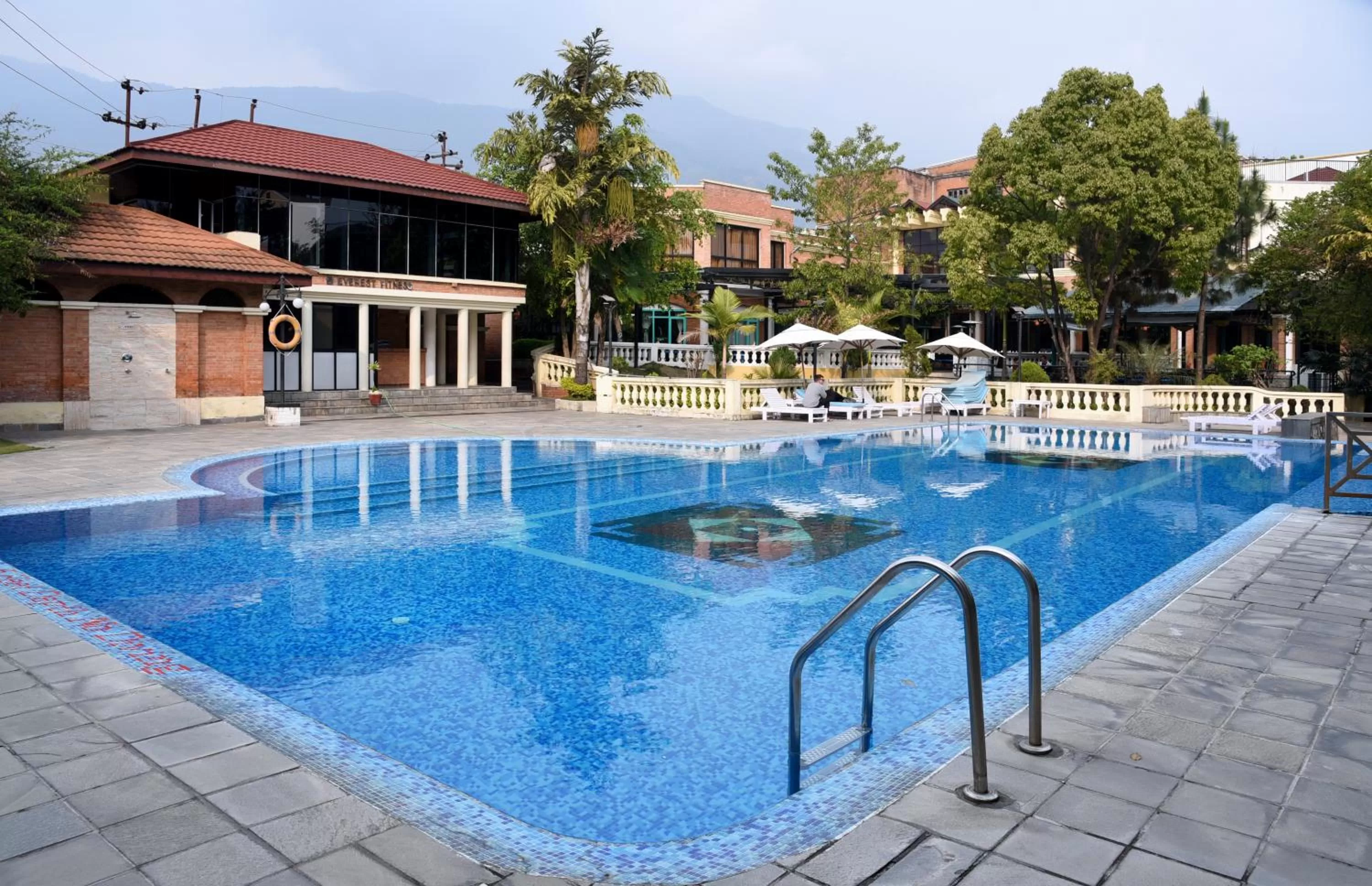 Swimming pool in Park Village Resort by KGH Group