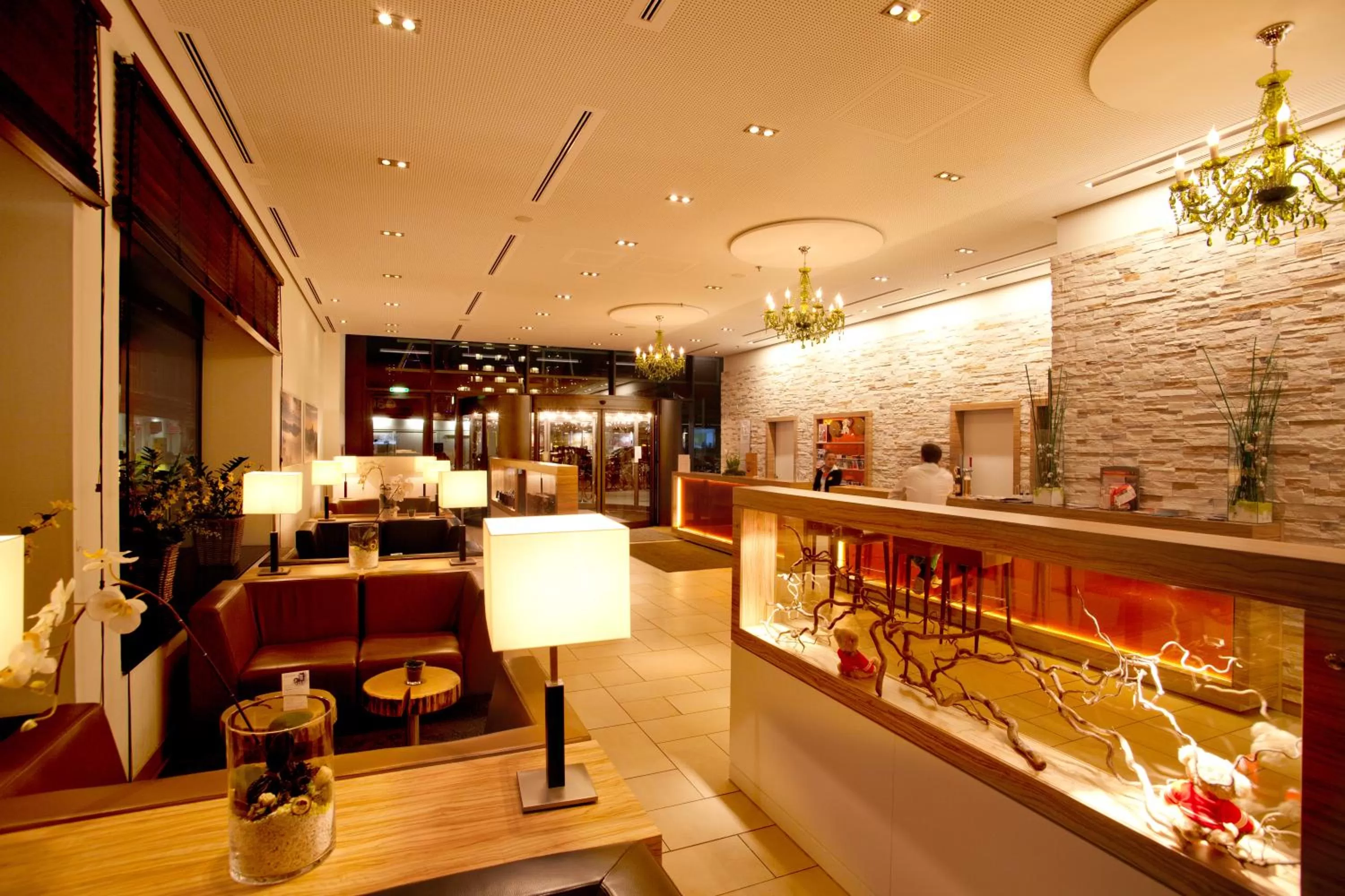 Lobby or reception in H+ Hotel Salzburg