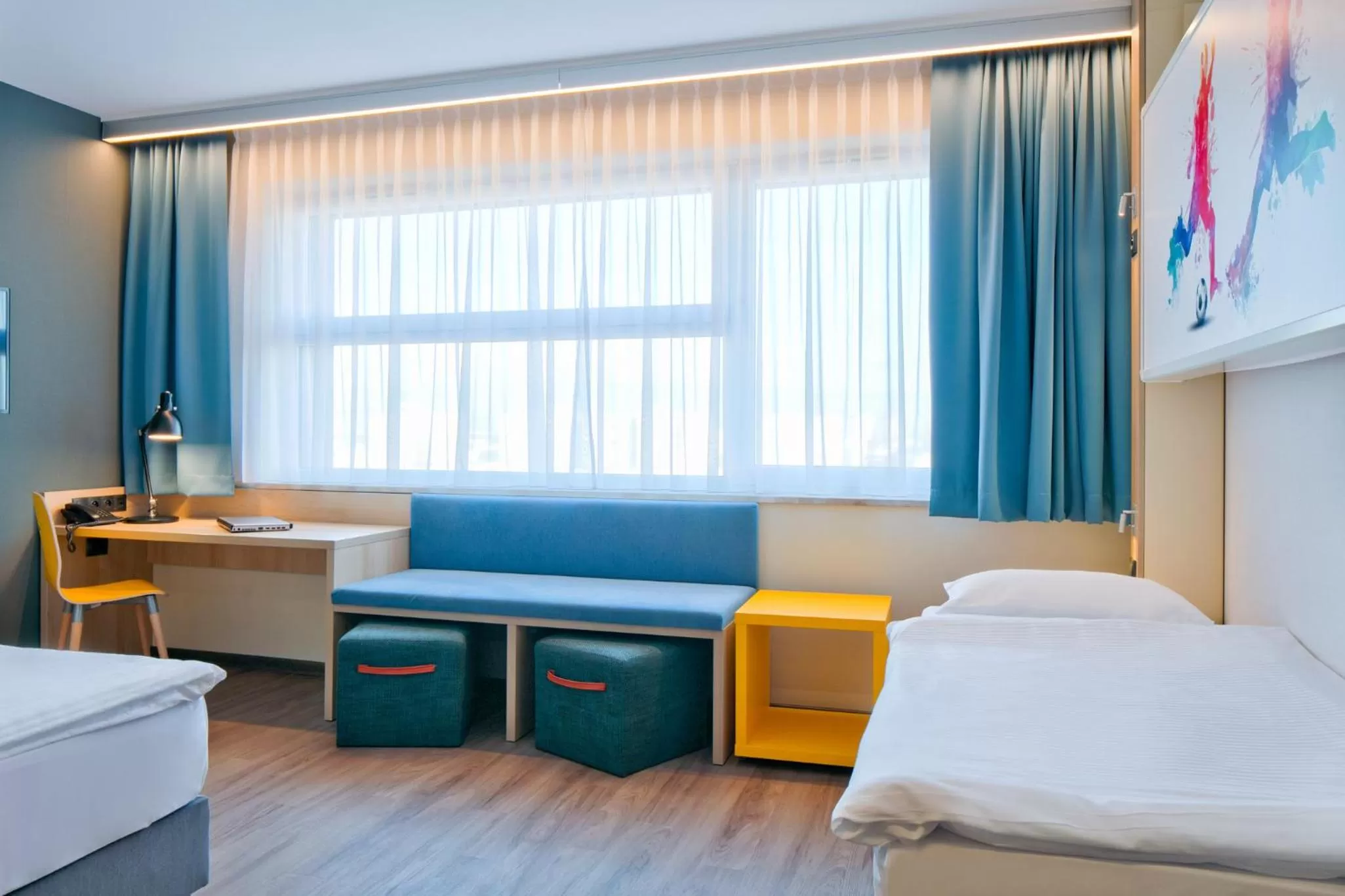 Living room, Bed in o3Hotel