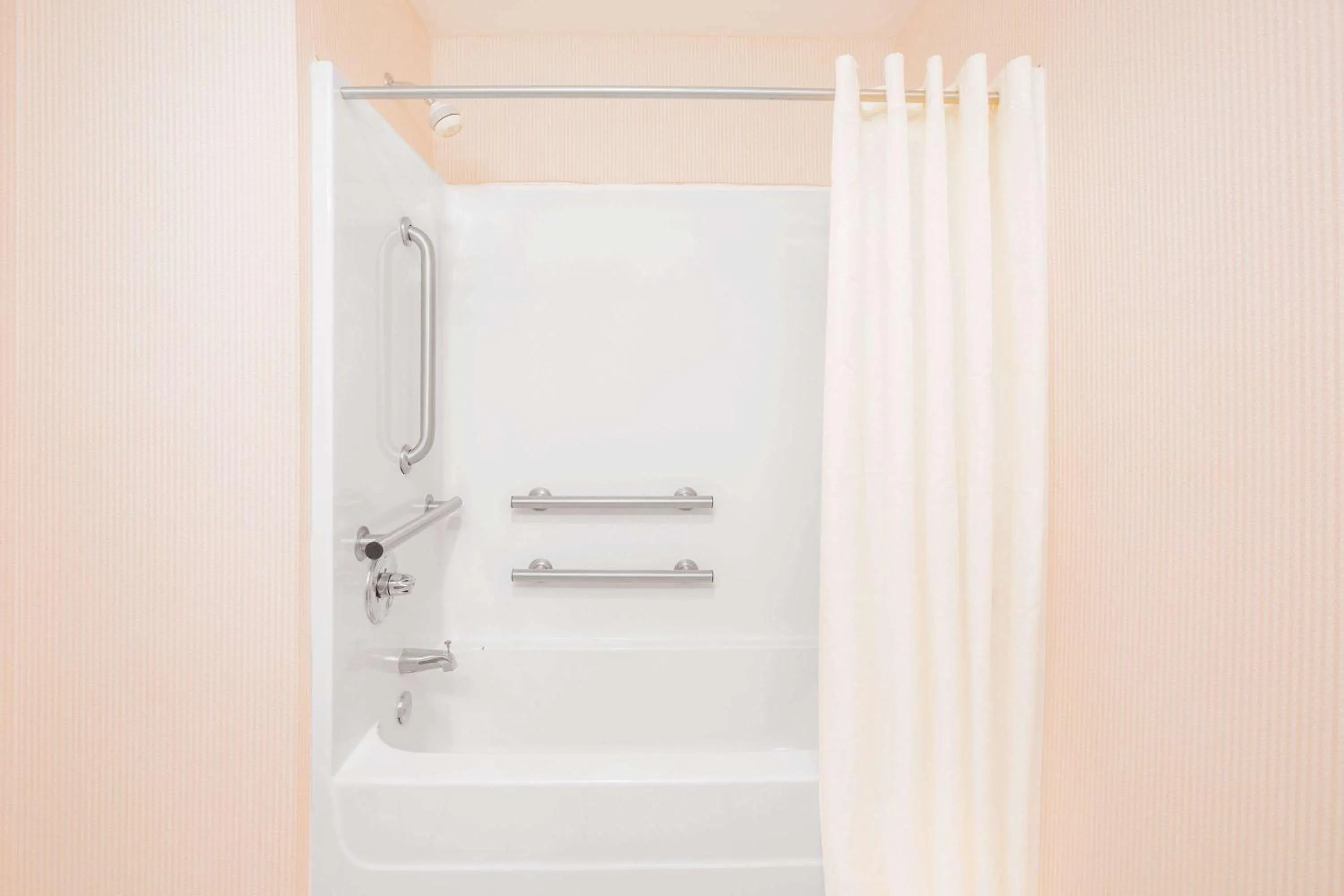 Bathroom in Days Inn by Wyndham Hattiesburg MS