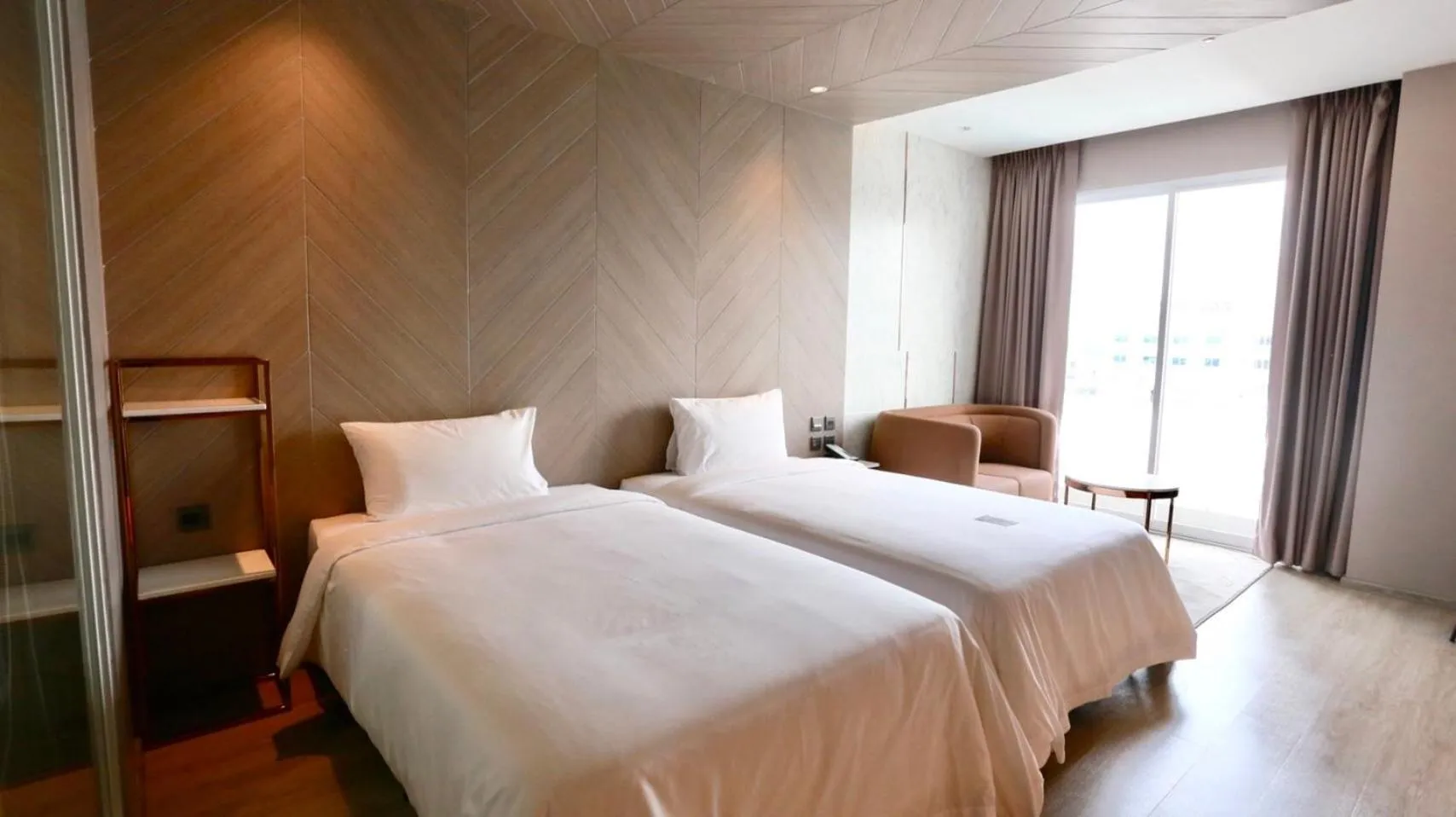 Bed in Golden City Rayong Hotel