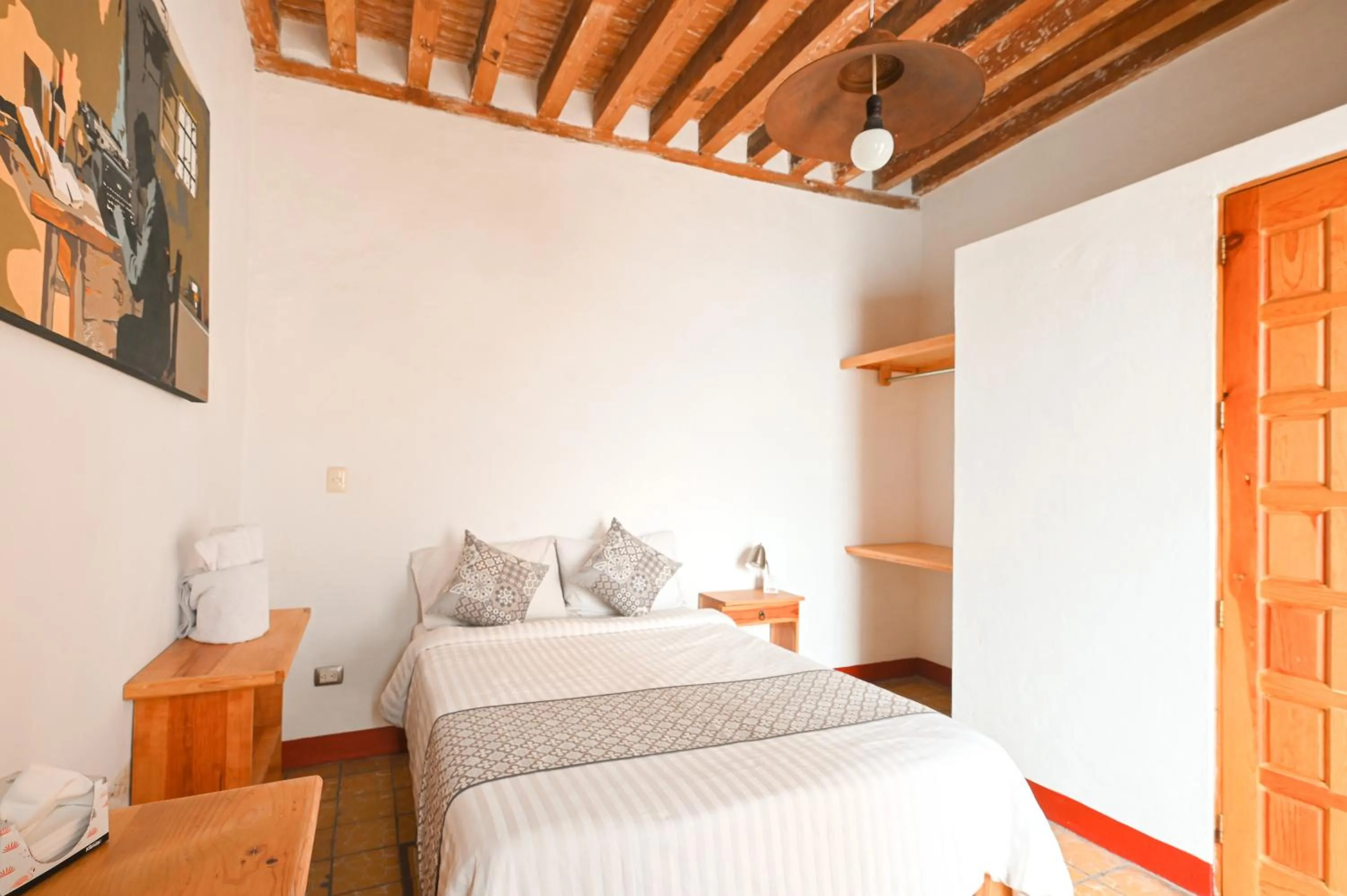 Bed in Hotel Meson Cuevano