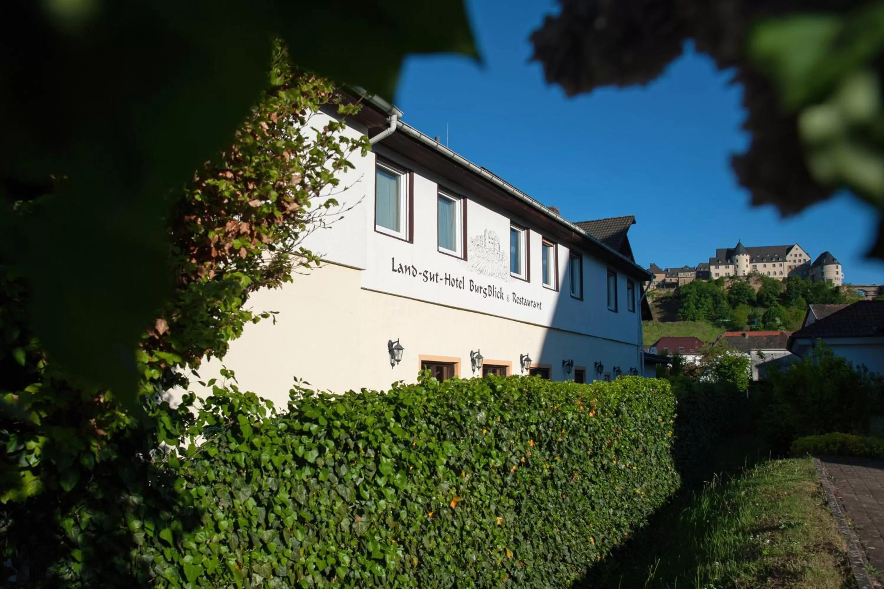 Property building in Land-gut-Hotel BurgBlick