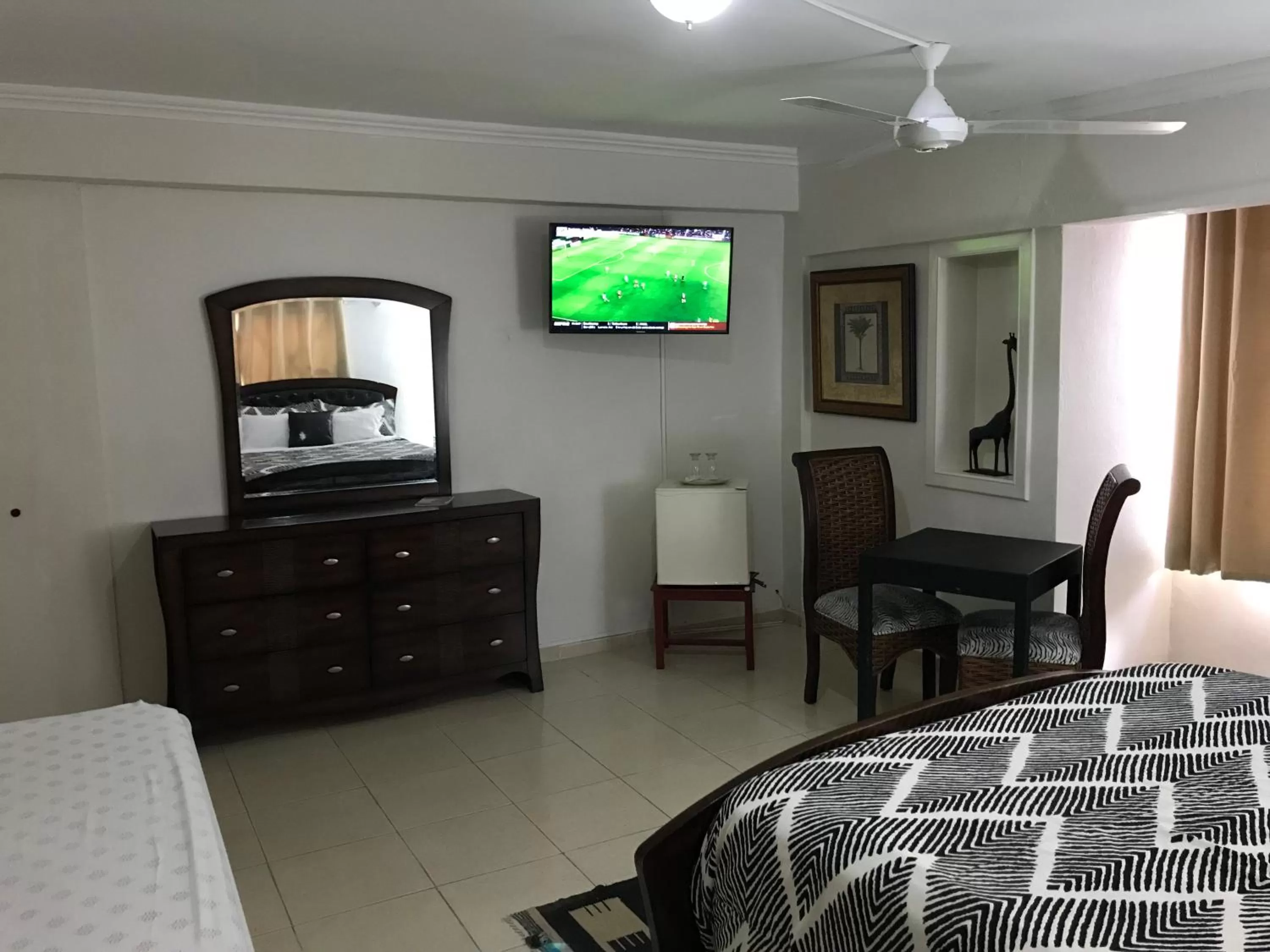 Bed, TV/Entertainment Center in Hotel Boutique Simona