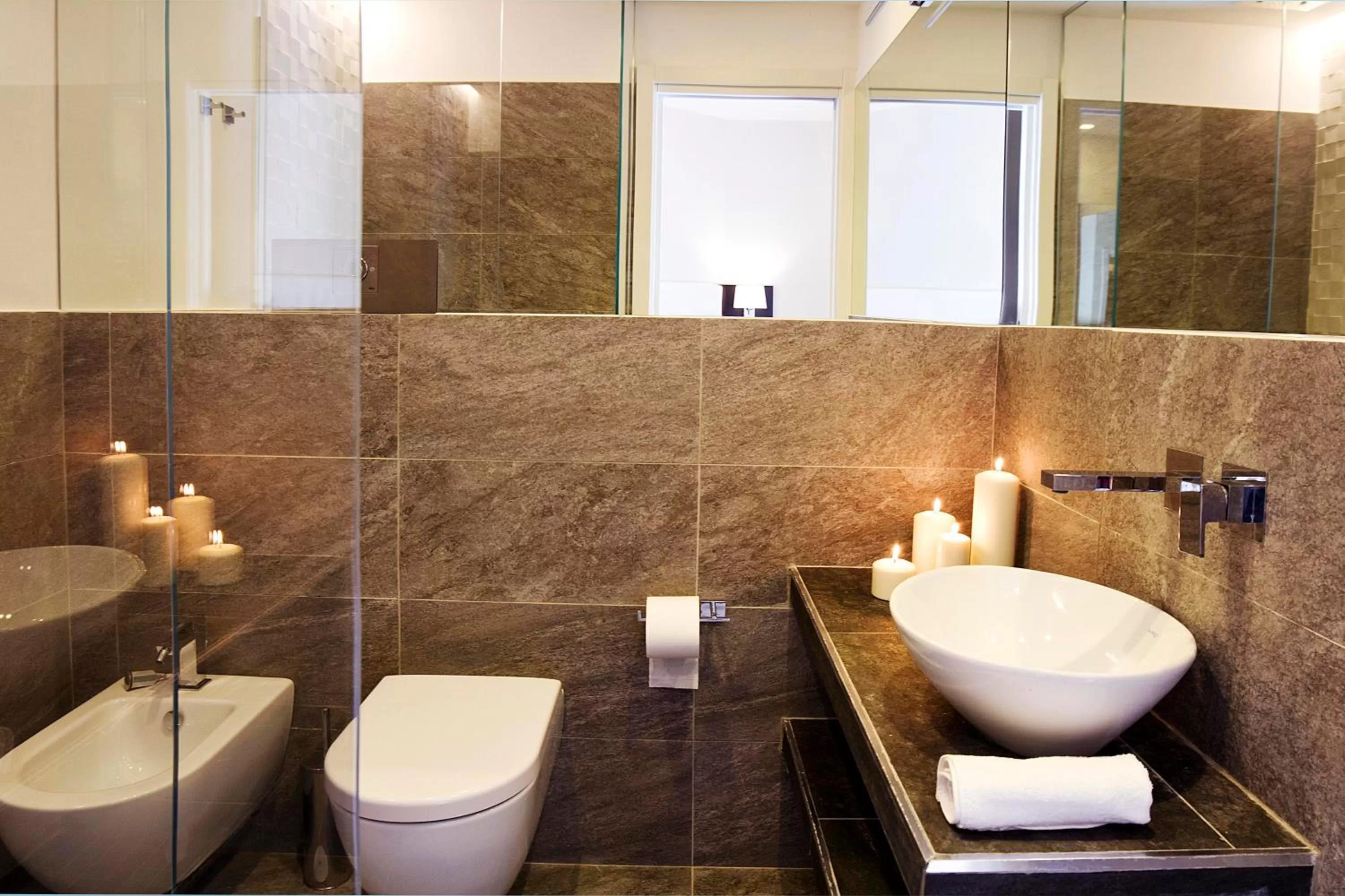 Toilet in Roman Holidays Boutique Hotel