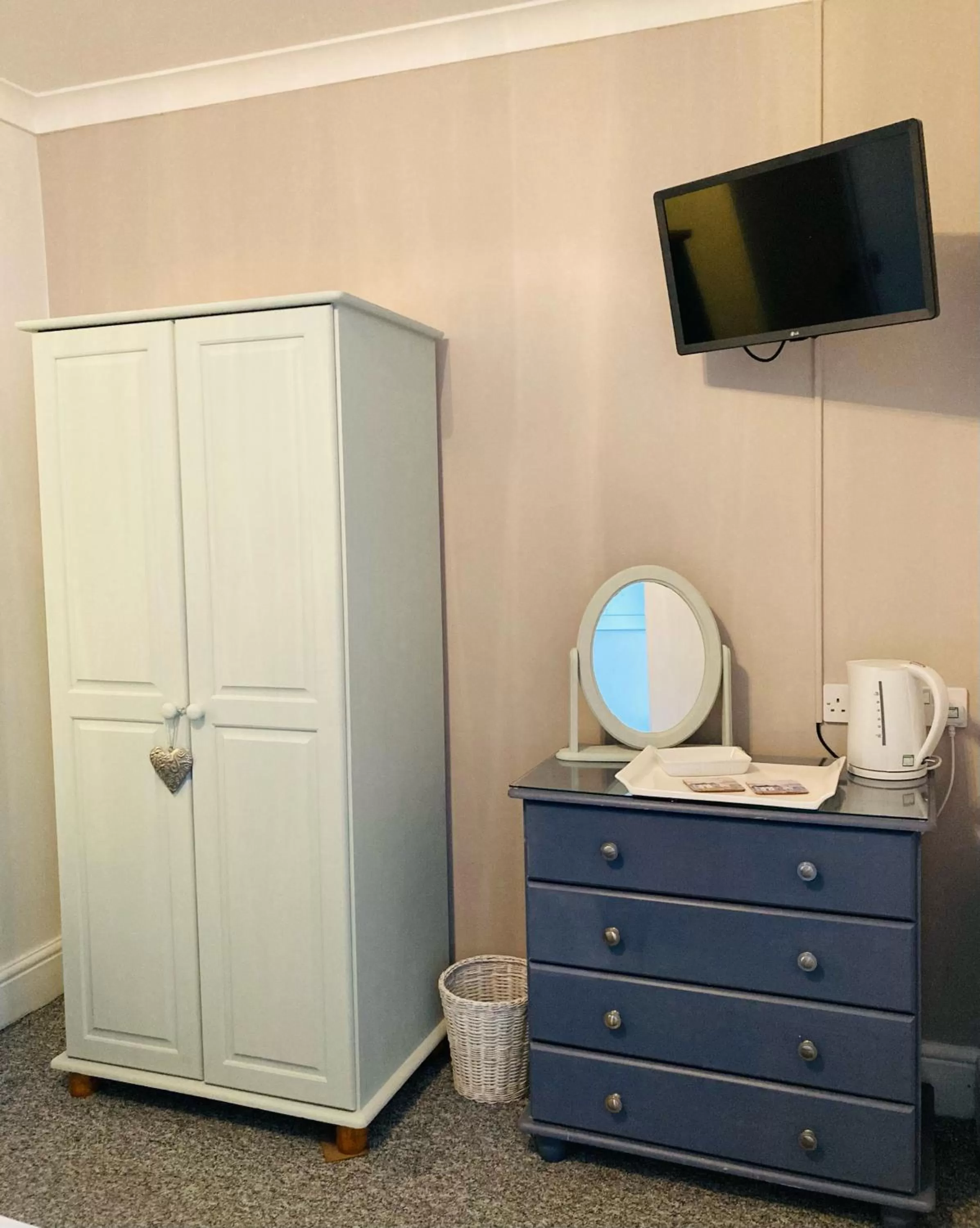 wardrobe, TV/Entertainment Center in The Wentworth Guest House