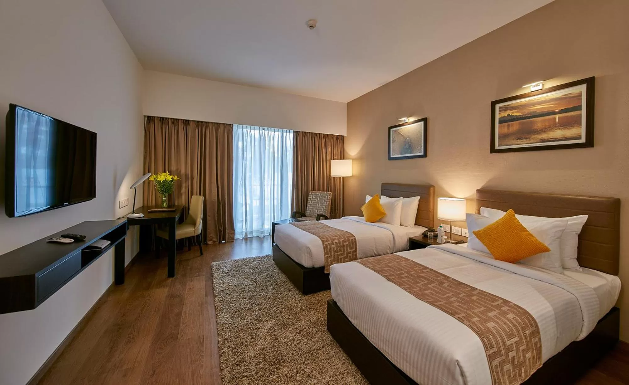 Bed in Signature Club Resort