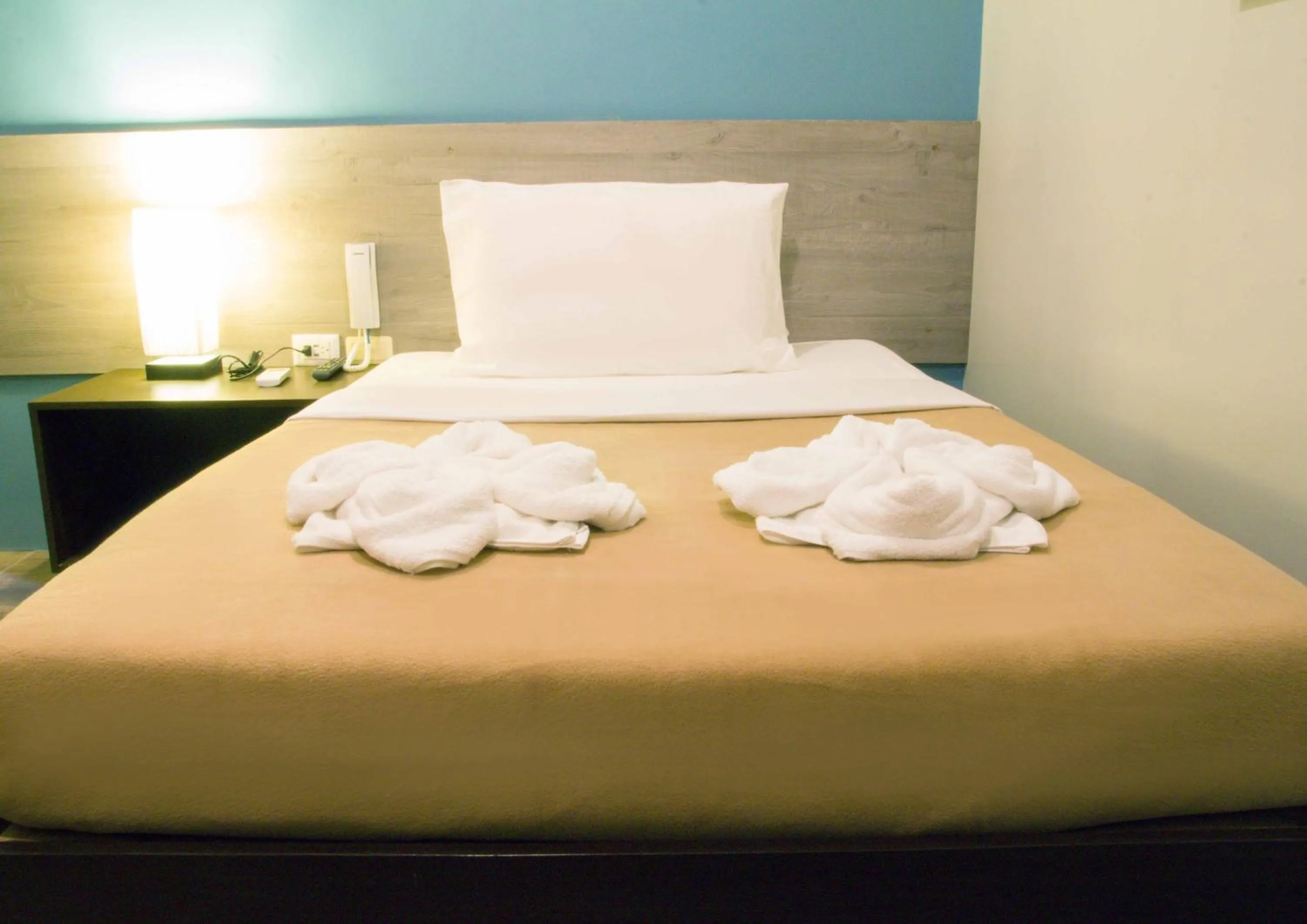 Bed in Sheridan Boutique Hotel