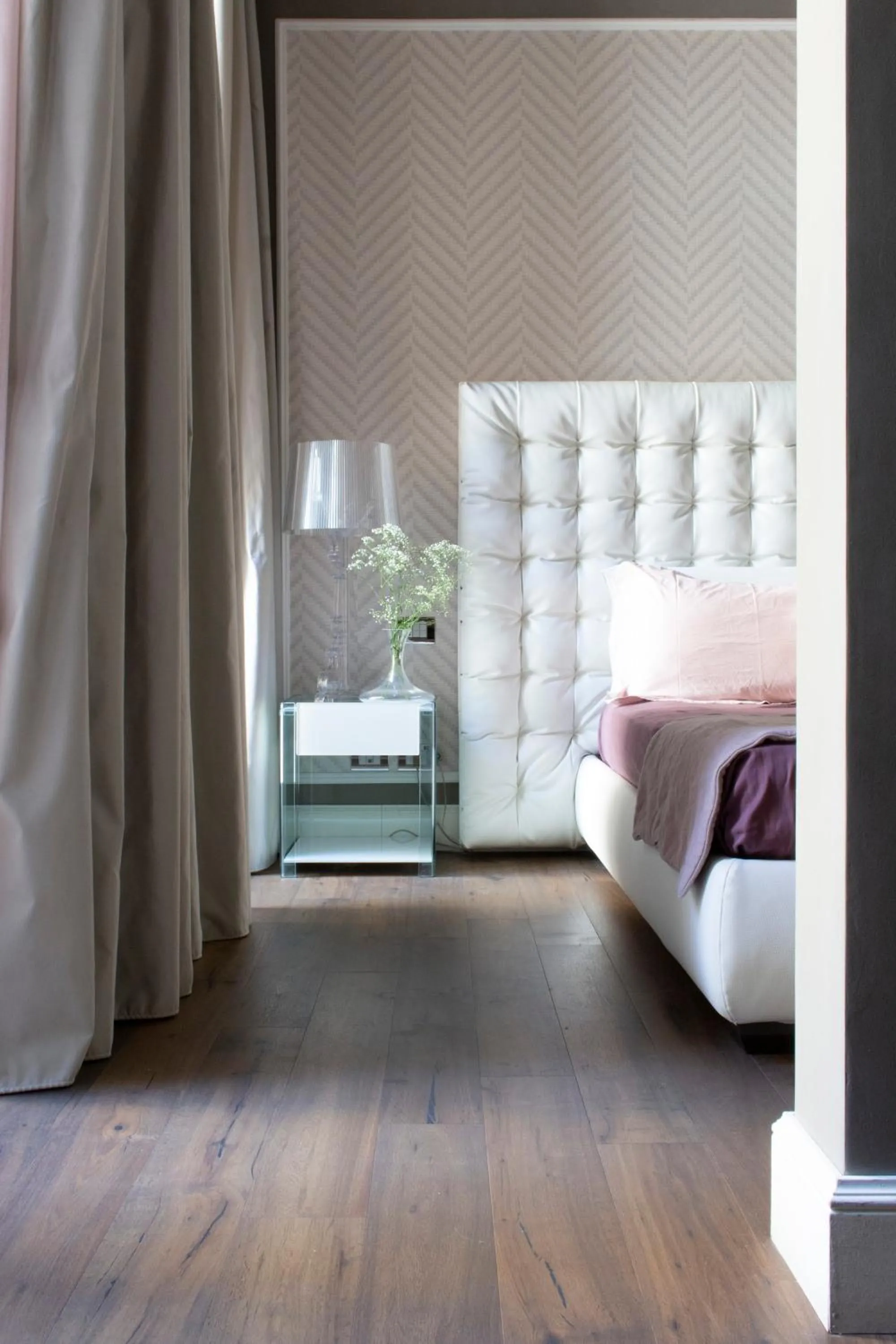 Bed in Le Quattro Dame Luxury Suites