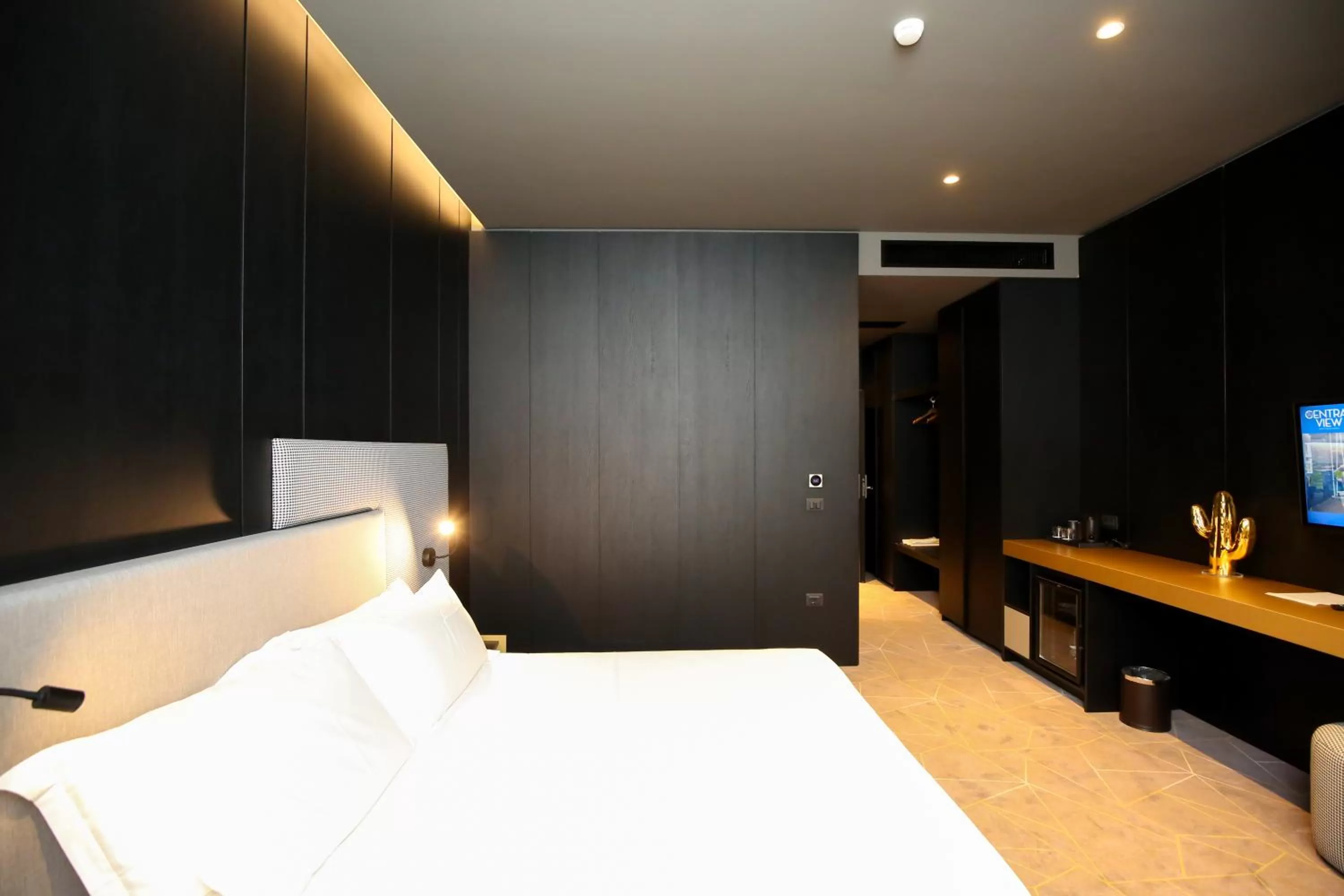 Bed in The Central View Boutique Hotel