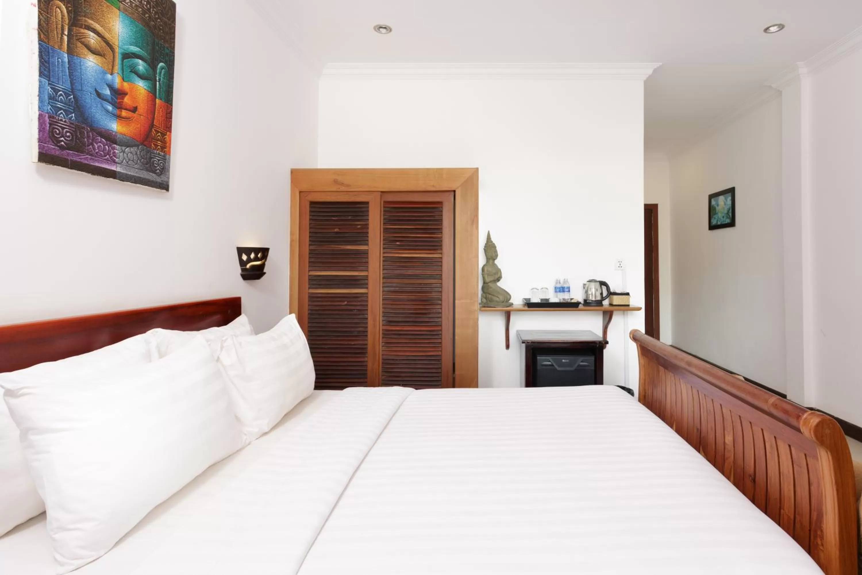 Bed in La Villa du Bonheur