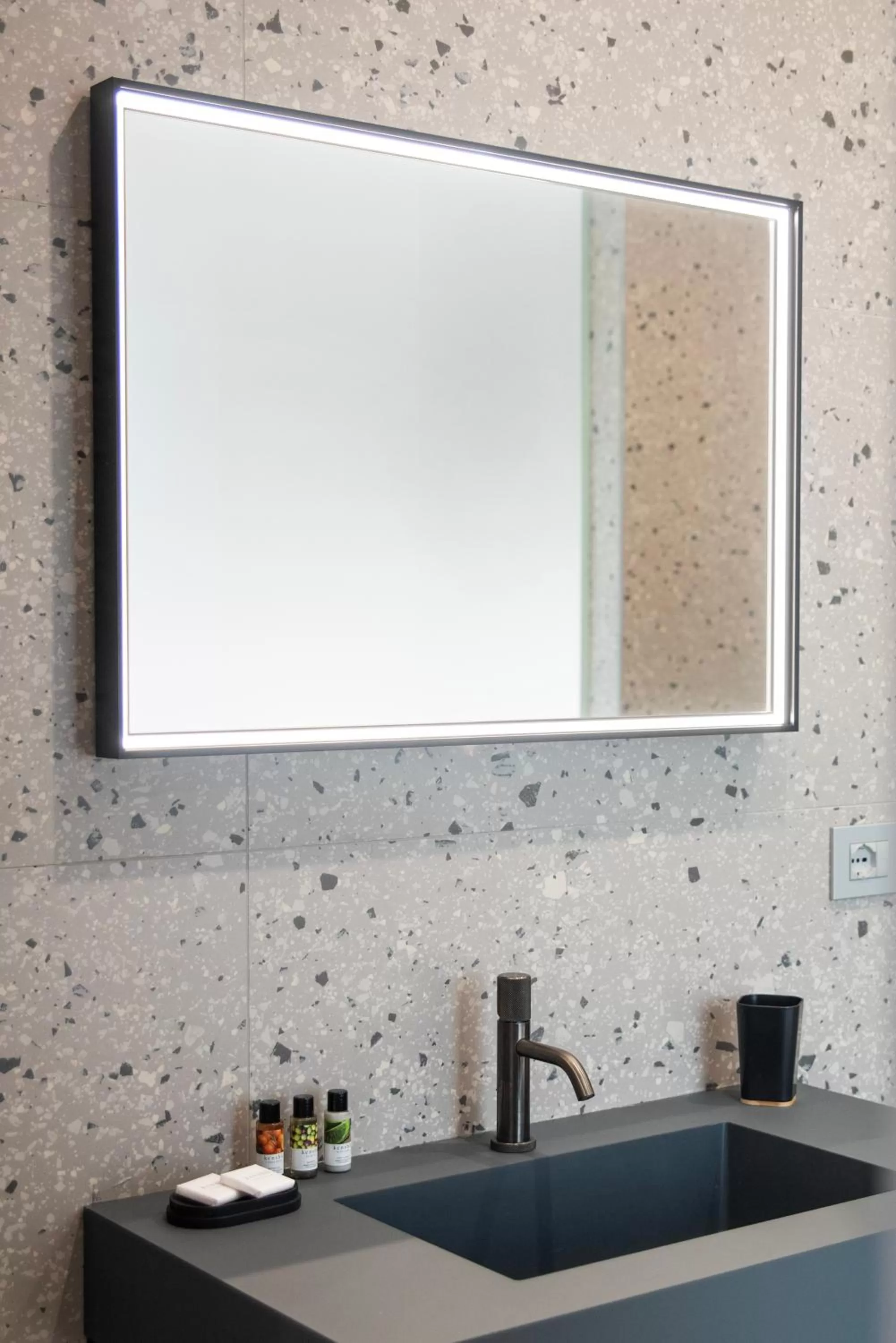 Bathroom in Lisetta Gardens Boutique & Suites